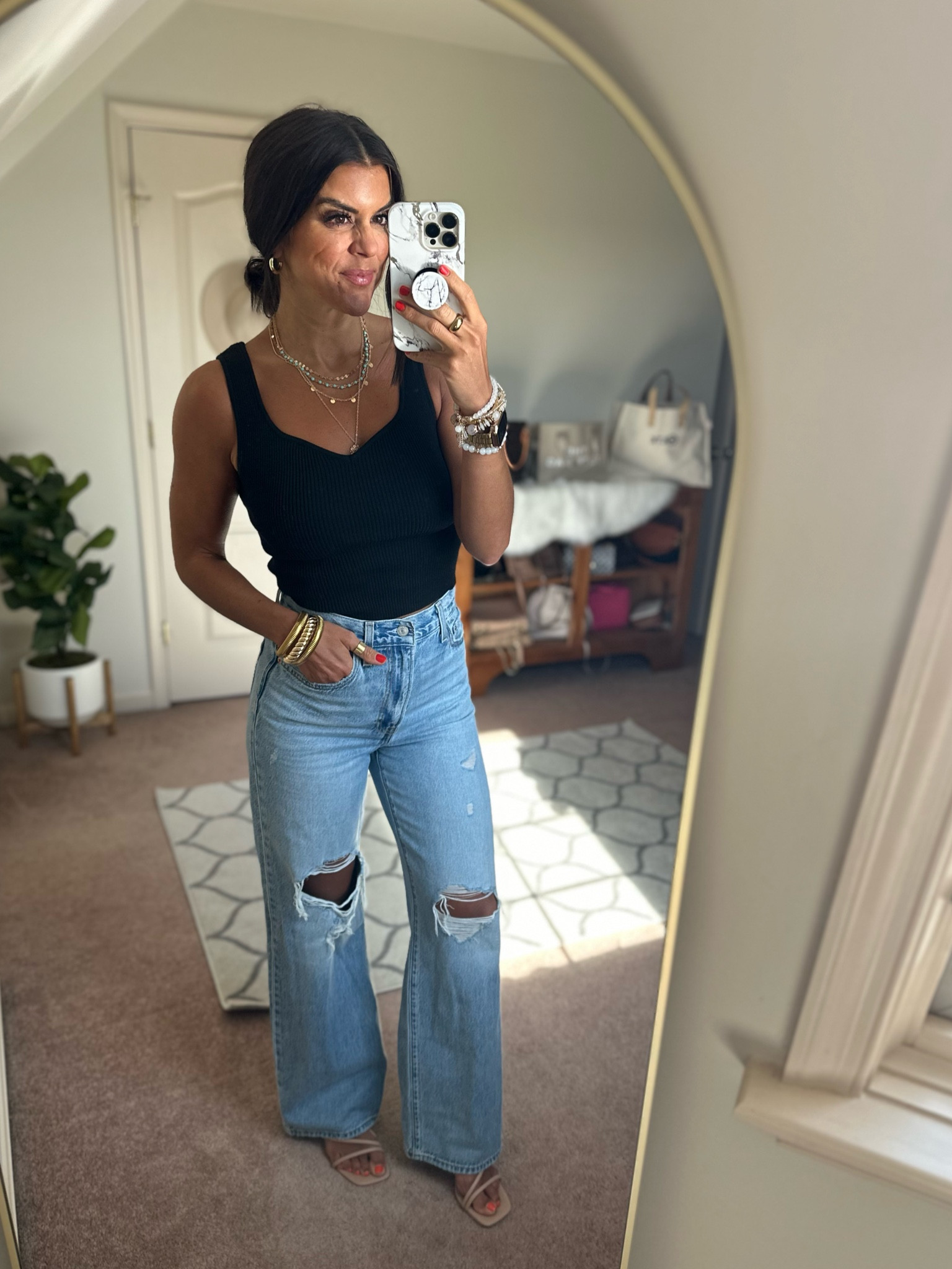 Size medium in Amazon tank 
Sizes up one to a 27 in Levi’s bc there’s no stretch. 

#LTKStyleTip #LTKFindsUnder100 #LTKSaleAlert