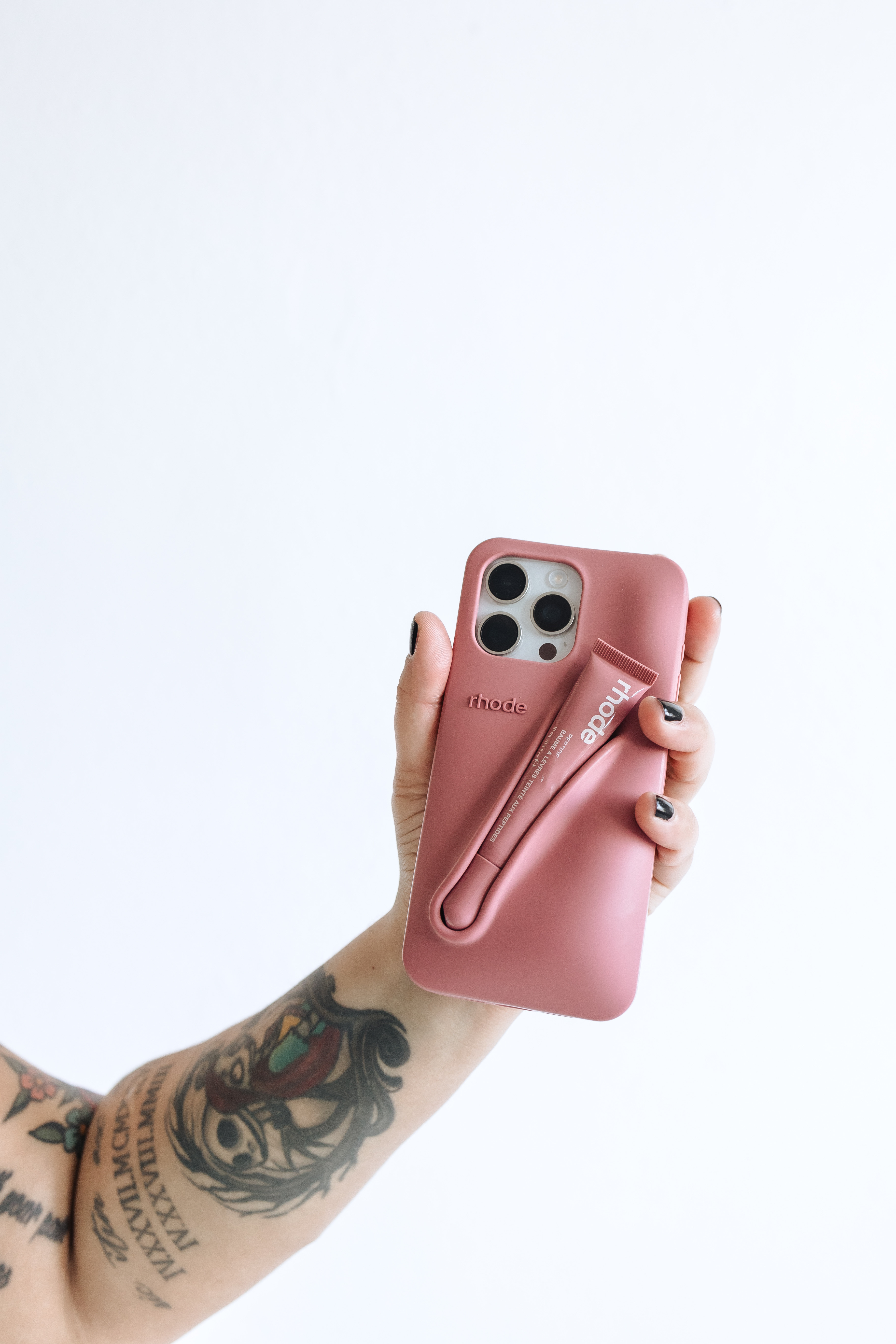 Okay but the Rhode lip phone case is actually genius.

The Rhode Lip Case has that clean minimal look but with a built in slot for your lip treatment. It keeps everything in one place and somehow makes your phone look cuter.

I love that it feels sleek and neutral, not bulky or gimmicky. Just simple, functional, and very on brand for that effortless everyday aesthetic.

The exact color I have may be sold out, so I linked similar options that give the same vibe. If you’re into practical accessories that still look chic, this one is worth it.

#LTKselfcare #LTKmorningroutine #LTKBeauty