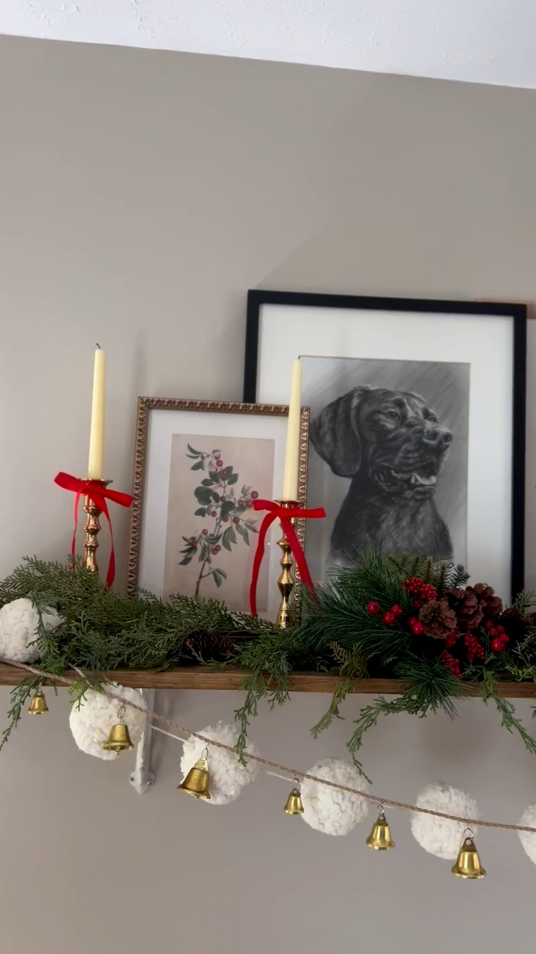 Christmas shelf styling. Christmas art work. Layered garland. Collected Christmas. 

#LTKHoliday #LTKSeasonal #LTKHome