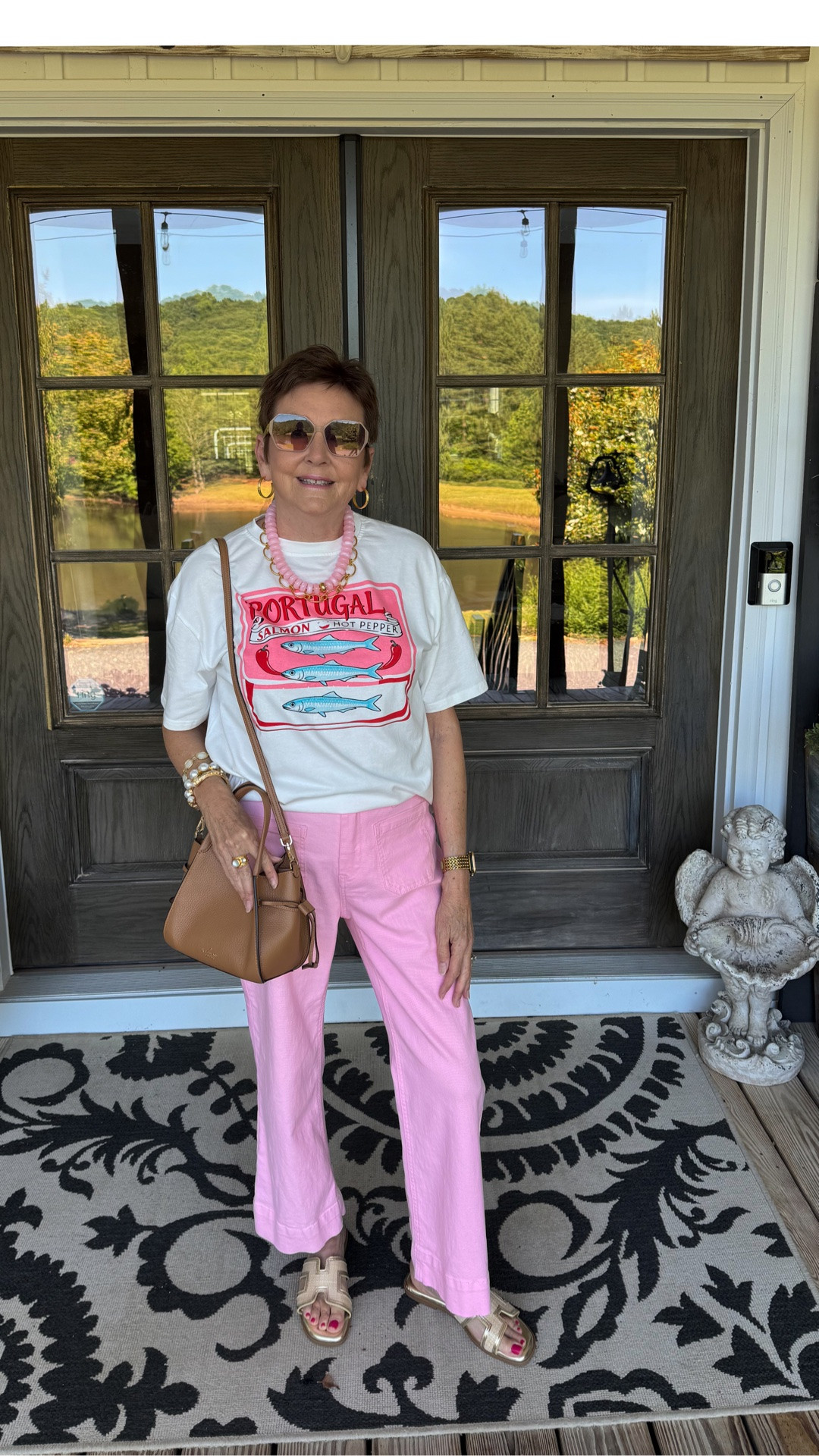 Fun summer style with graphic tee and pink jeans.

#LTKOver40 #LTKMidsize #LTKSeasonal