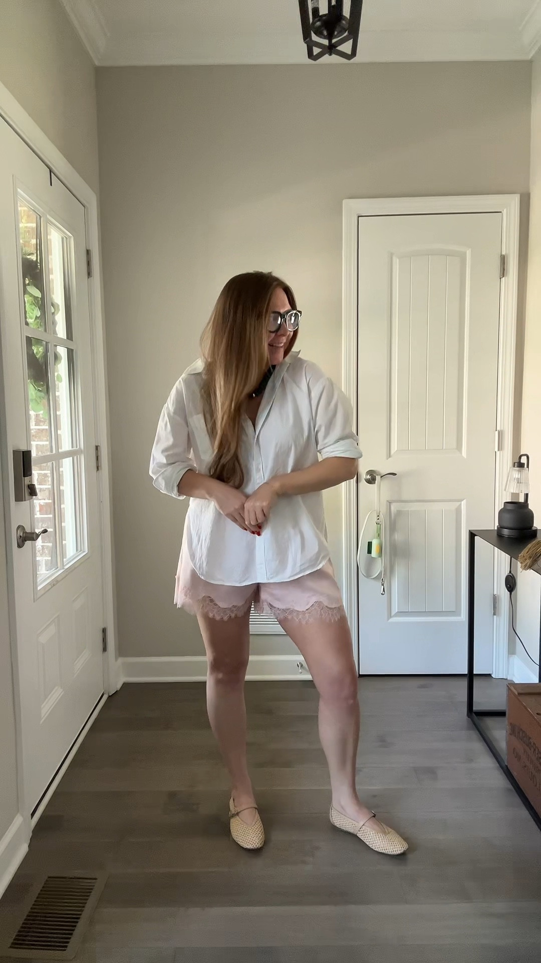 Oversized White Button Fown shirt / wearing a small 
Pink satin and lace shorts / tts wearing a medium 
Chunky blue light glasses 
Chunky bead necklace 
Tan Mary Jane flats 

#LTKWorkwear #LTKdayinmylife #LTKootd