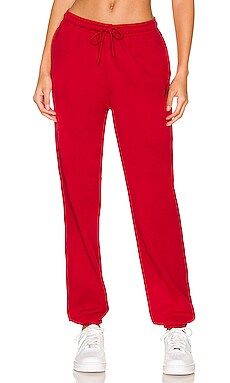 Jordan Fleece Pant Core in Gym Red from Revolve.com | Revolve Clothing (Global)