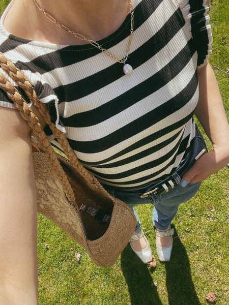 Italian girl summer. This shirt is so soft and chic. Just might wear it every day. Jeans and top fit tts. Basket bag is going on year 3 and is still a favorite 🧺

#LTKfindsunder100 #LTKitbag #LTKshoecrush