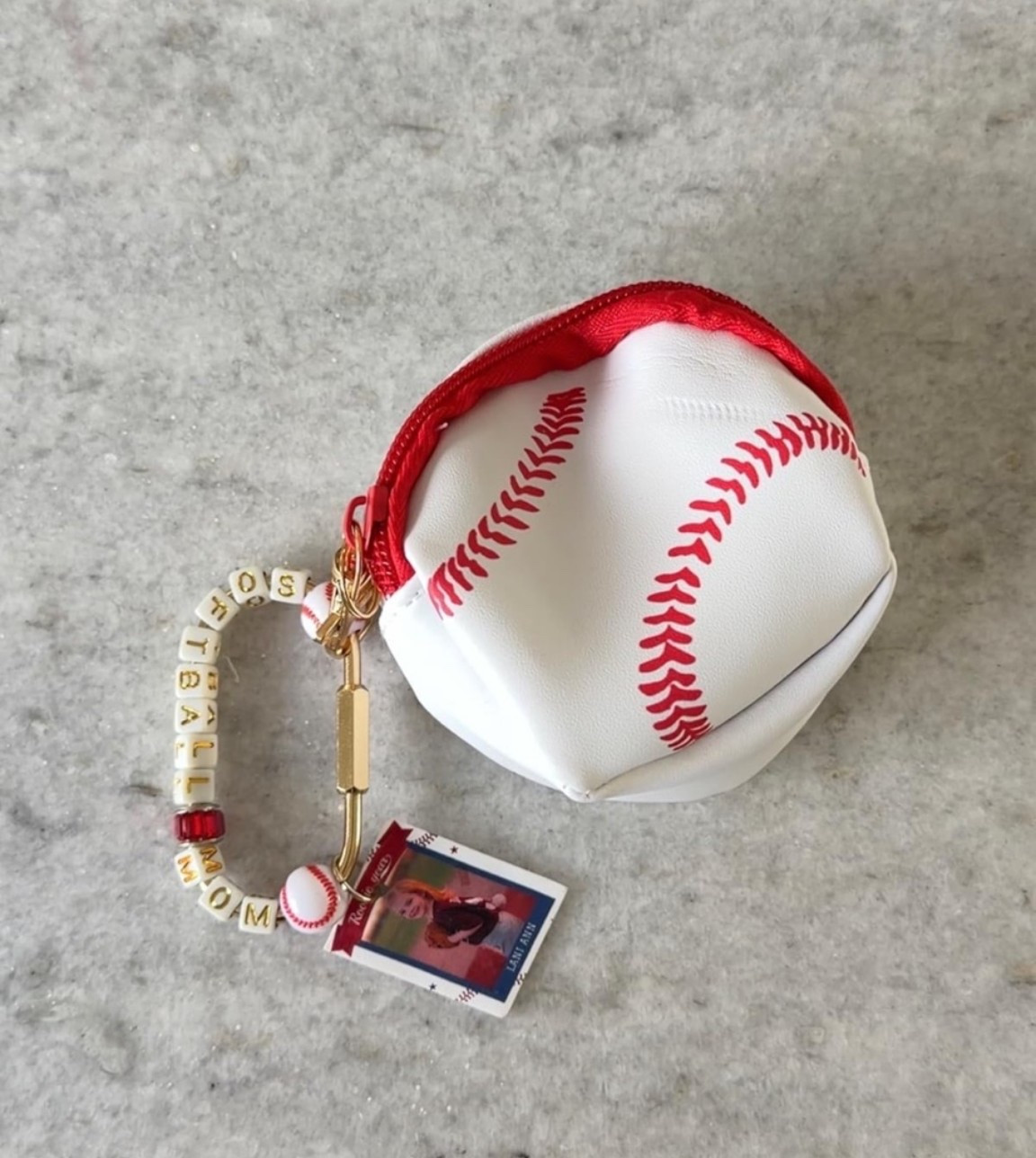 One of my favorite personalized sports gifts ⚾️

This baseball pouch keychain is such a fun way to keep lip balm, cash, earbuds, locker keys, or small essentials together while showing off your love for the game. The custom name beads and personalized photo make it feel extra special for players, team moms, coaches, and softball families.

Linking everything used to make this custom keychain pouch for anyone searching for baseball gifts, softball gifts, sports mom gifts, team gift ideas, personalized keychains, baseball accessories, and custom sports keepsakes. Such a cute idea for end-of-season gifts, tournaments, team celebrations, or stocking stuffers for athletes

#LTKmomlife #LTKKids #LTKSeasonal