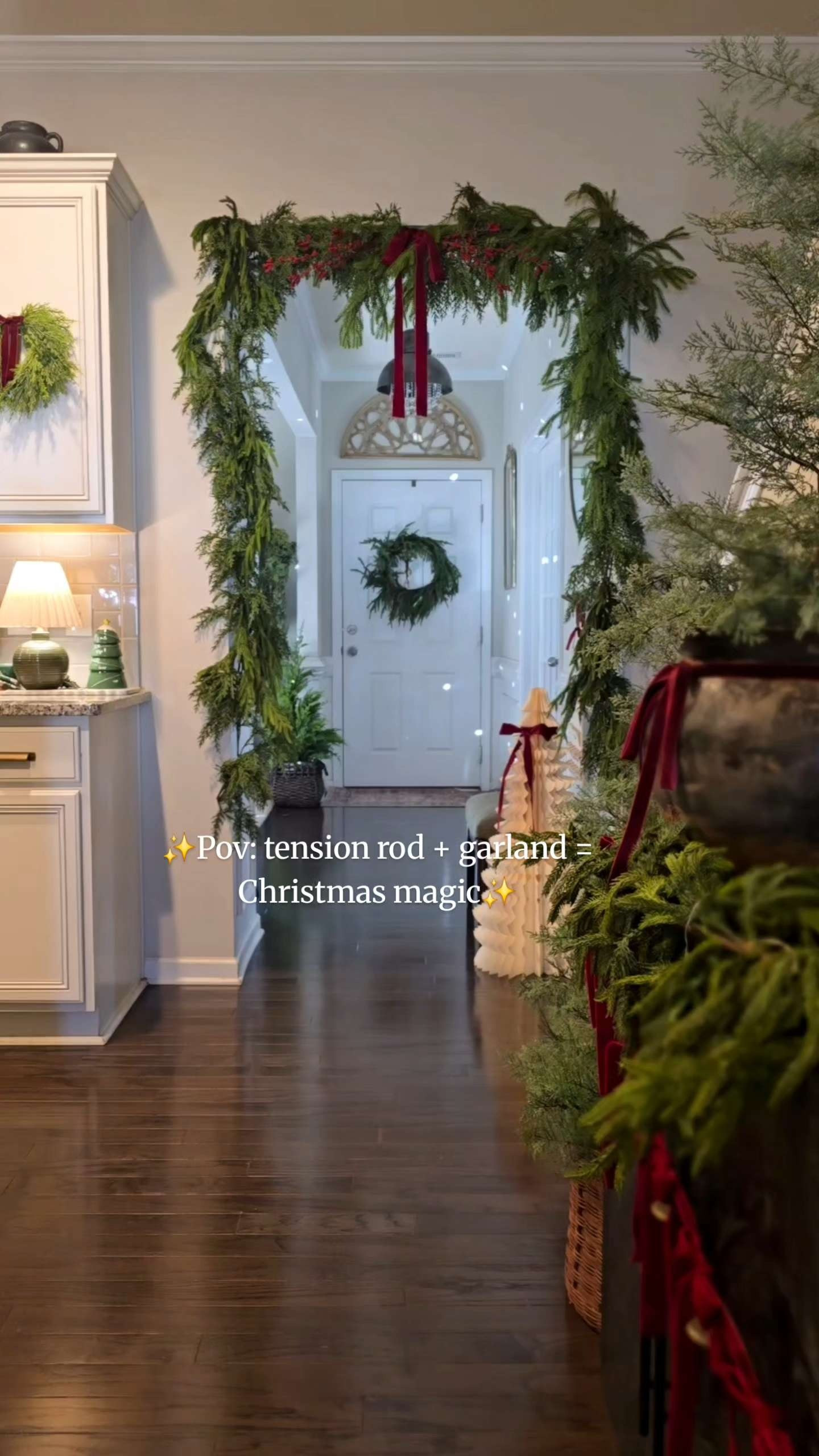 Tension Rod Garland Hack with my favorite 15 foot Garland! I added 2 norfolk pine and some norfolk pine picks to fill in the gaps!  

 #LTKHoliday #LTKSeasonal #LTKHome