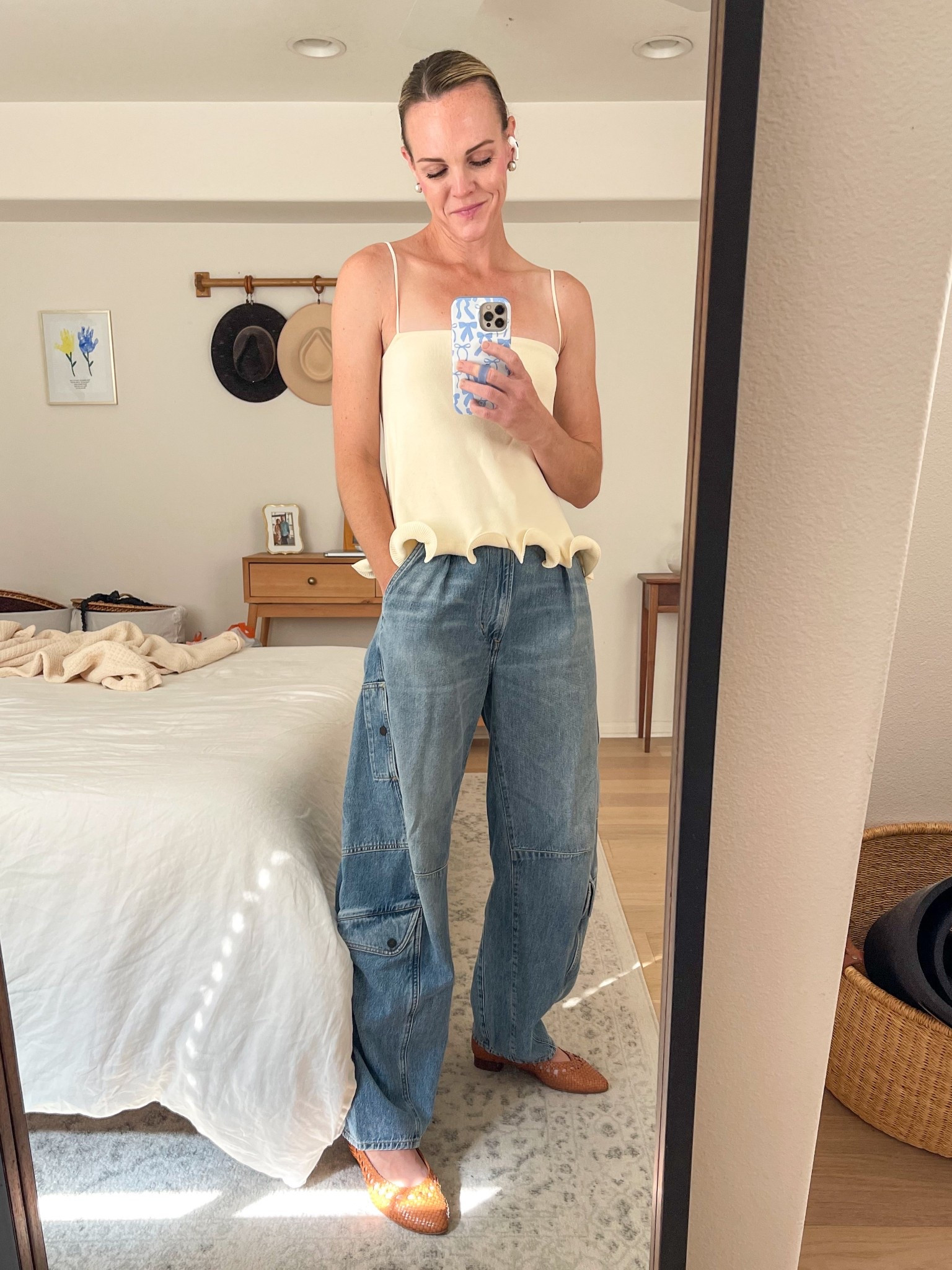 OOTD 💛
Tank runs TTS, wearing a small
Jeans run big, size down, wearing a 24
Flats only come in whole sizes so if you’re in between, size up! 

#LTKOver40 #LTKStyleTip