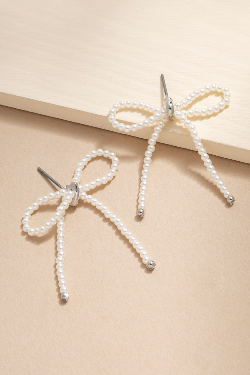 Dollie Bow Pearl Drop Earrings | Francesca's