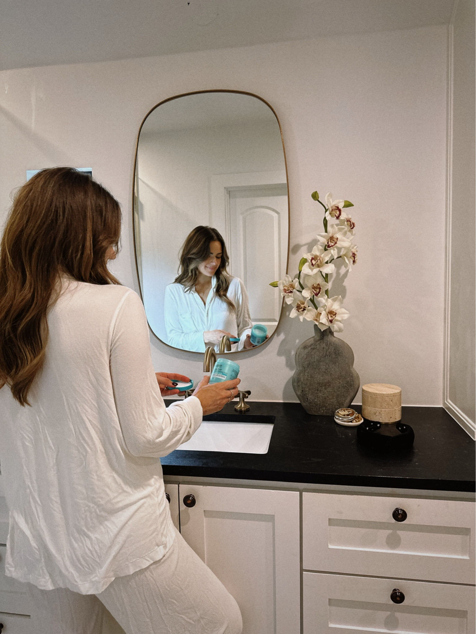 GURWM #ad Some days between mom life, keeping our house clean, & working from home I don’t get myself ready & put makeup on. No matter what my day looks like, whether I’m fresh faced in comfy clothes or dressed up, I always end the day with my skincare routine. 
I’ve shared this @garnierusa HA Cleansing Balm I got via @target before with you all a few times before. It’s a great drugstore cleansing balm option that works to help hydrate & cleanse the ski, but you can also use it a few times a week as a mask. I put it on for about ten minutes & then rinse with water & I’m left with more glowy, hydrated skin. Such a great product you can use multiple ways in your routine!
I have it linked in my @shop.ltk here. @targetstyle #targetstyle #targetPartner #Target #liketkit
 

 

#LTKBeauty