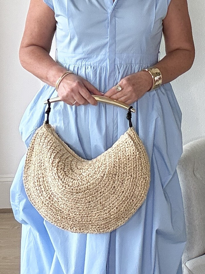 Love this woven bag with the modern handle. Minimal chic. A statement piece!

#LTKootd #LTKgrwm #LTKOver40