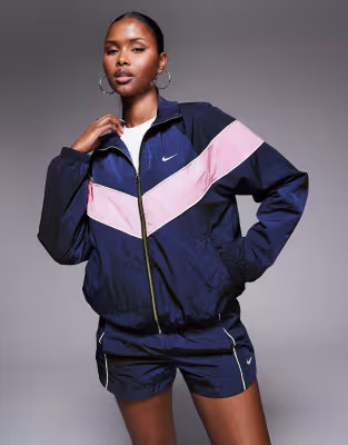 Nike Windrunner woven track jacket in navy and pink | ASOS | ASOS (Global)