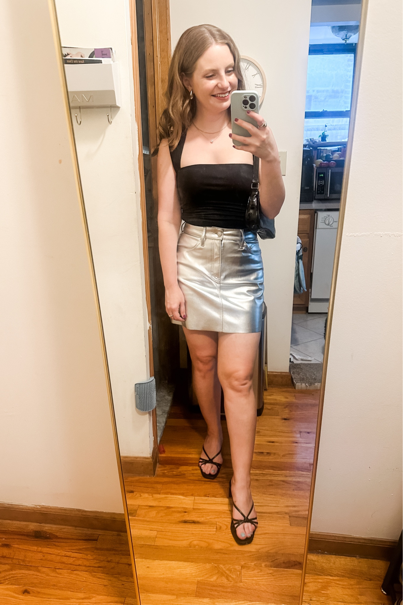This top is perfect for going out and this silver miniskirt is so fun! Wearing a S in the top.

I can’t link my exact skirt, but it’s in stock at Express- https://www.express.com/clothing/women/high-waisted-metallic-mini-skirt/pro/07650646

#LTKxAF #LTKSaleAlert