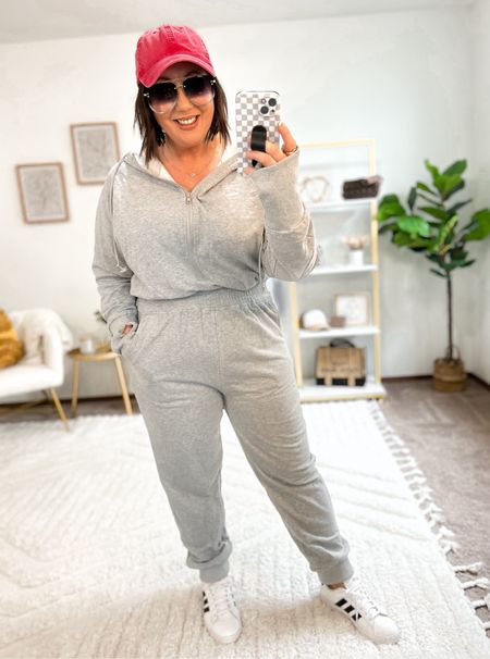 Jogger jumpsuit!  I’m so surprised at how much I love this thing!  Ordered it thinking it was a 2 piece set.  It’s so comfy. Easy to get in and out of. Super stretchy waistline. Fits tts. Wearing a large!  

#LTKfindsunder50 #LTKSeasonal #LTKmidsize