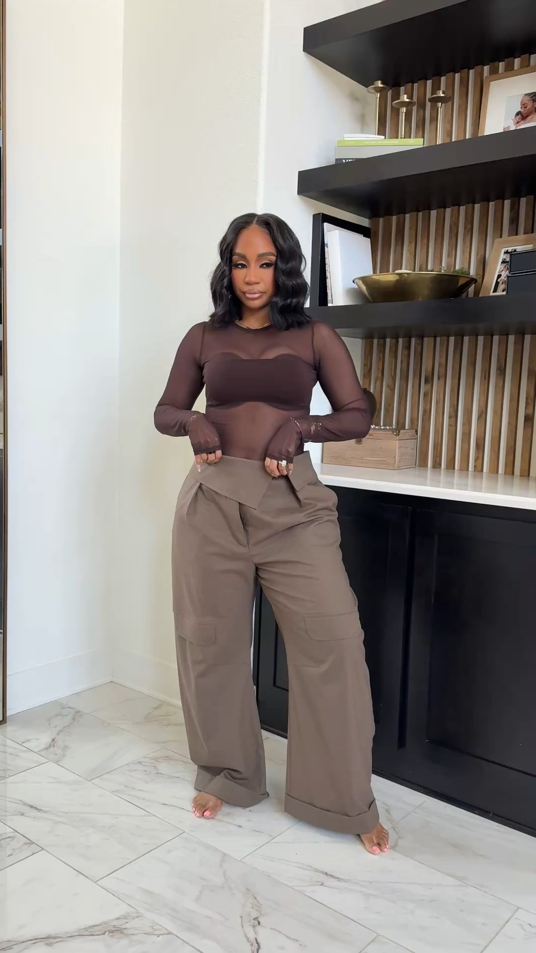 Brown mesh bodysuit with built in “bra” paired with fold over asymmetric waist foldover! 

#LTKootd