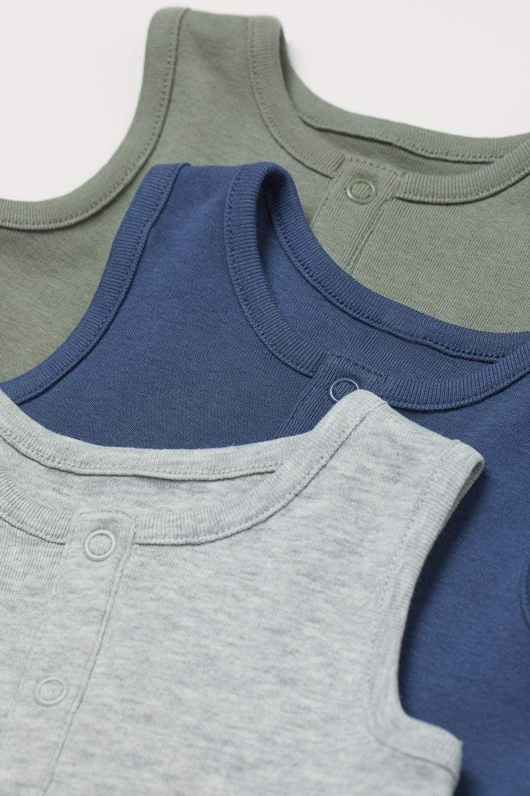 Conscious New Arrival
	Sleeveless romper suits in soft, organic cotton jersey. Short legs. Snap f... | H&M (US + CA)