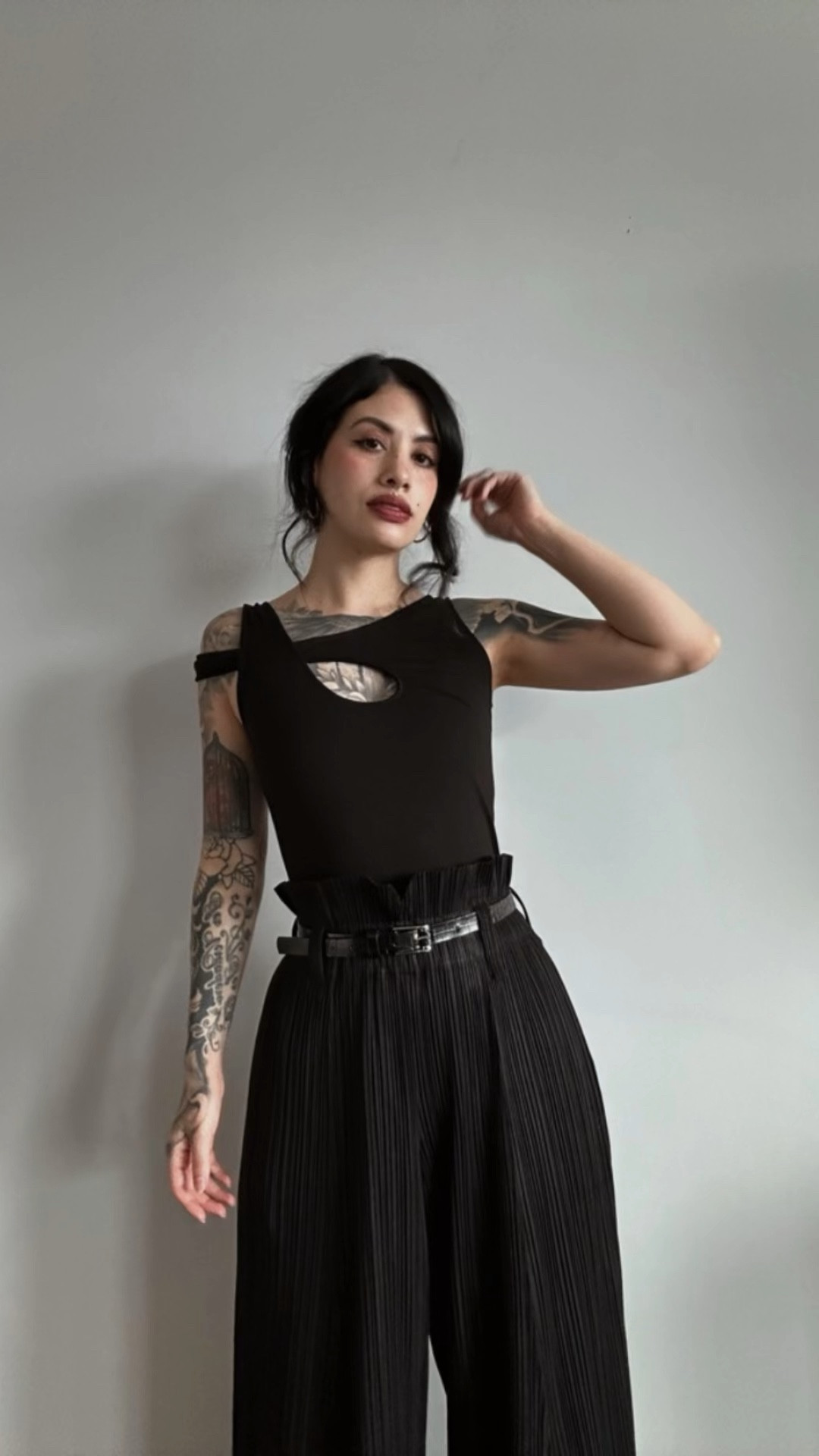 Wide leg plisse trousers and the Noelle black cut out top from Marcella 🖤

#LTKstyletip #LTKVideo #LTKSeasonal