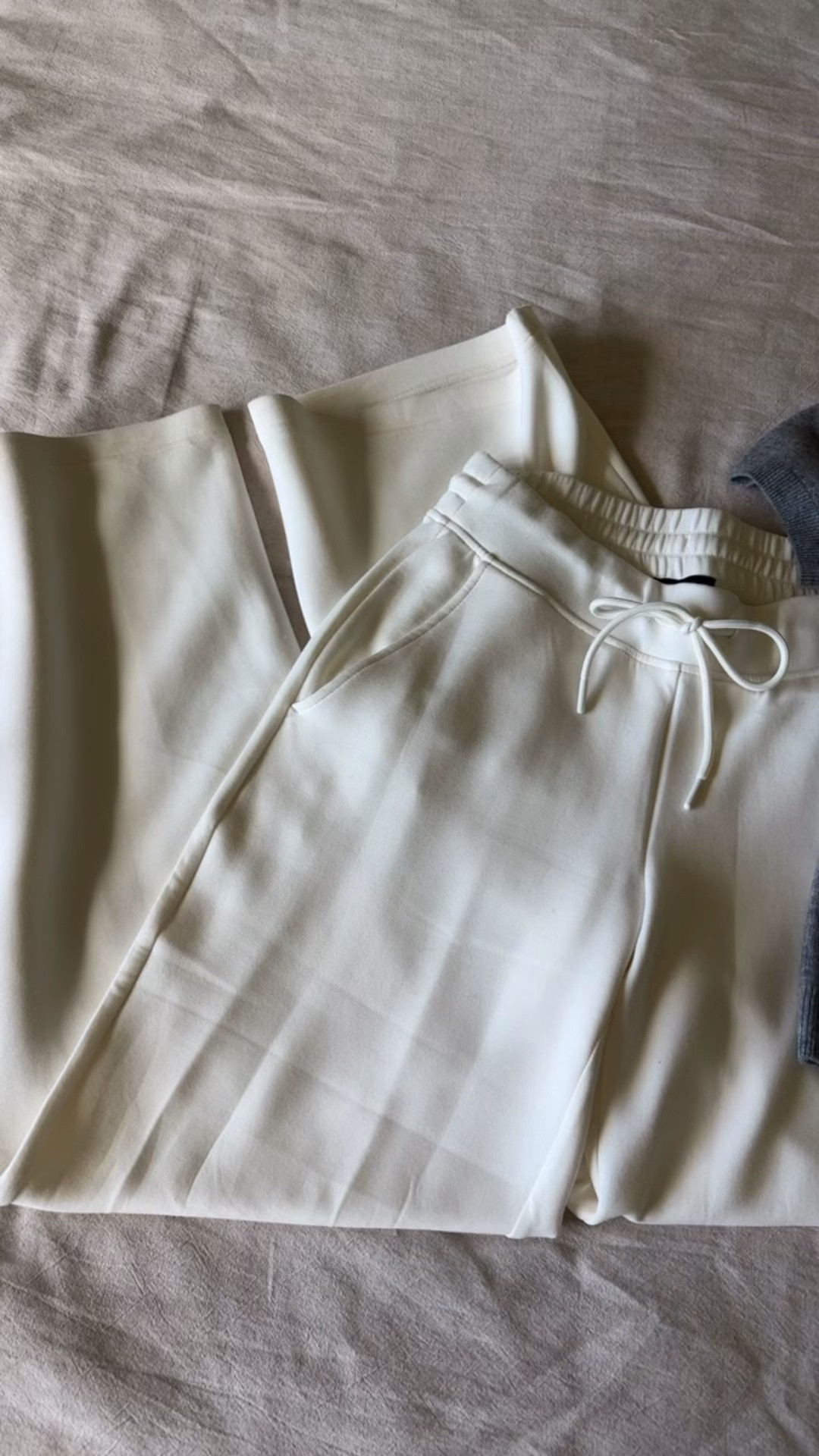 These off white cream lounge wide leg pants from @Quince are exactly the kind of effortless spring staples everyone wants right now. The SuperSoft fleece is lightweight, cozy, and unbelievably comfortable with the perfect relaxed wide leg fit, elastic drawstring waist, and an easy short sleeve sweater that pairs with everything. Quiet luxury comfort but still polished enough to wear out of the house. 🤍 #quincepartner