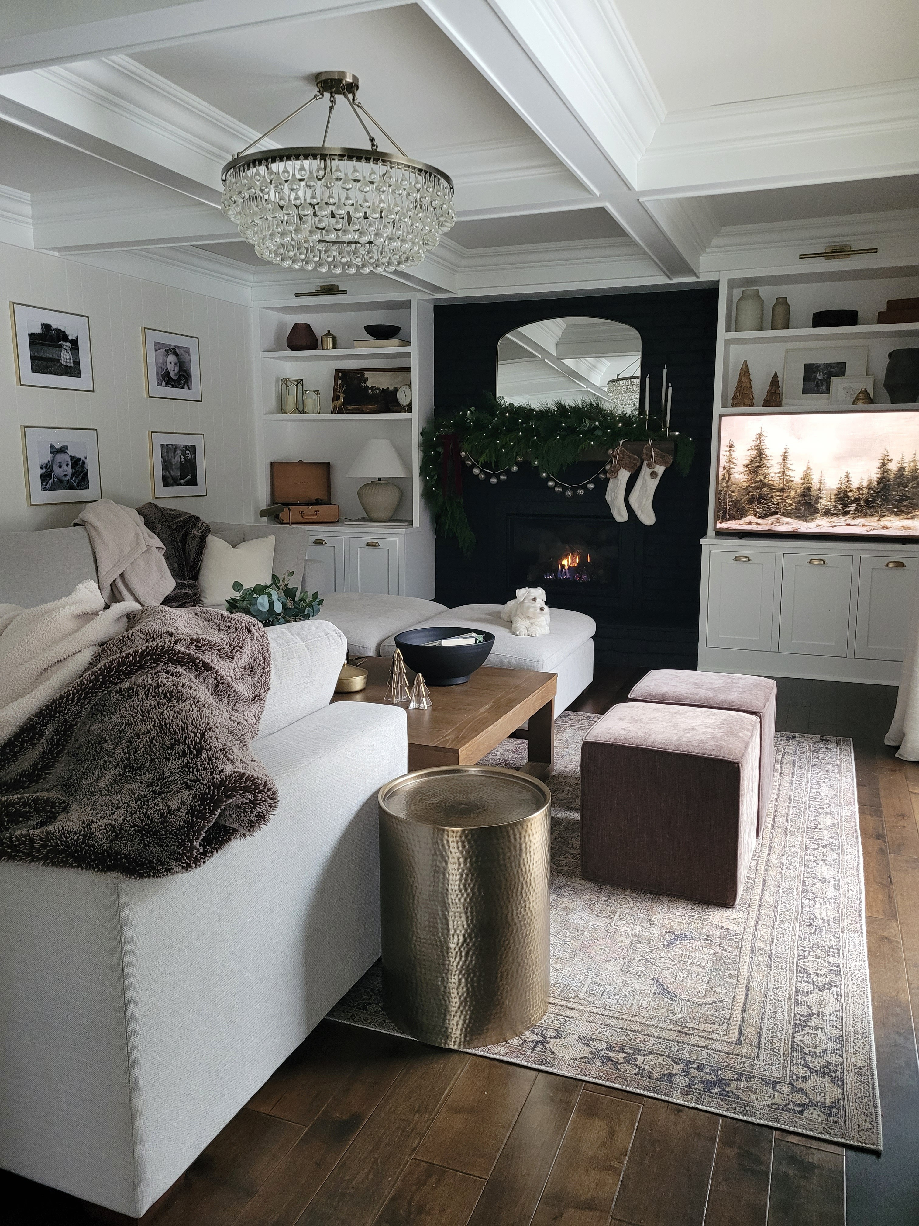 Holiday Family Room - this sectional sofa and oversized coffee table  is perfect for hosting movie nights or cocktails during the holidays.  I added cozy blankets and cube ottomans for additional seating during game nights and my family never wants to leave this room! Fuselage decor,  built in styling,  built ins, shelf styling,  coffee table styling 

#LTKHome #LTKHoliday