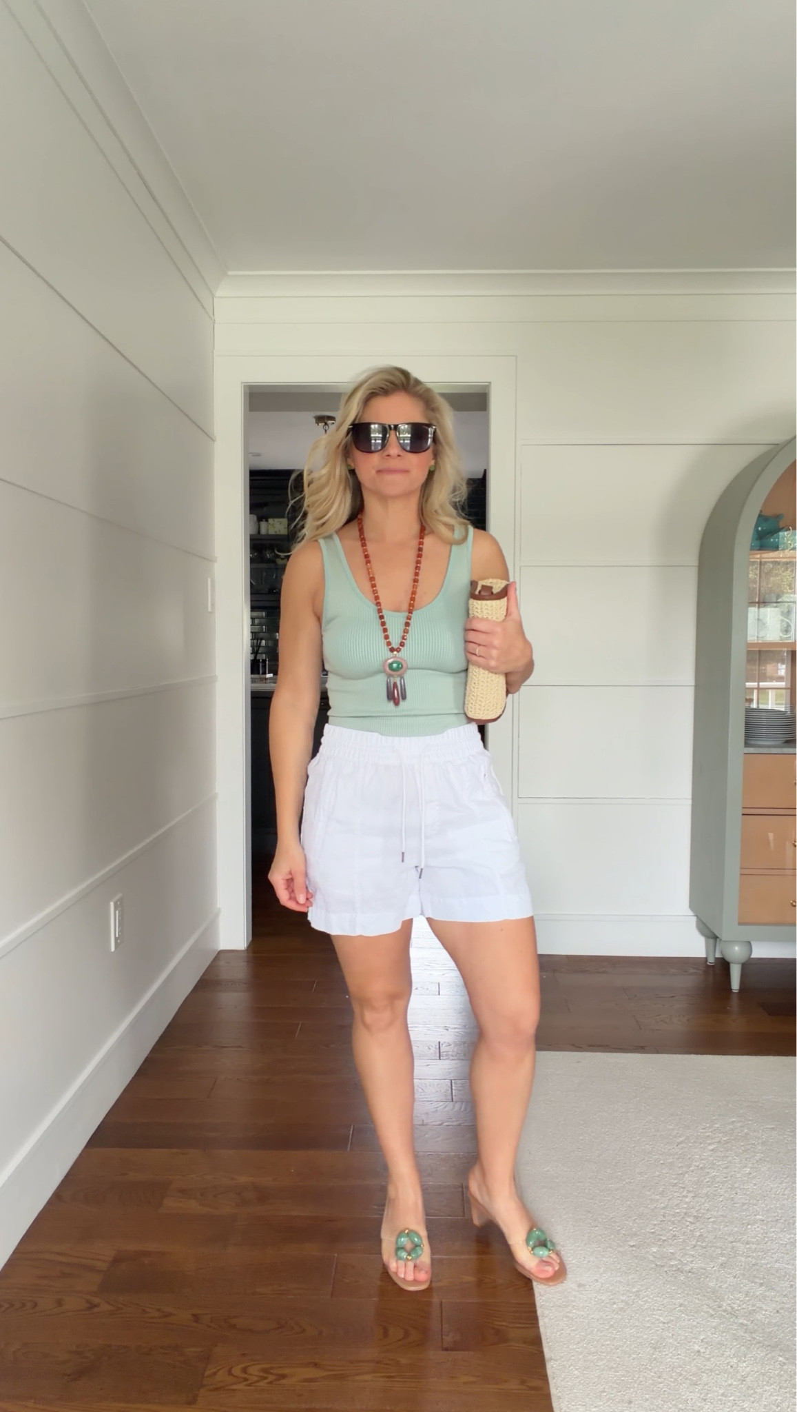 Outfit formula: cropped aqua ribbed tank + linen shorts + statement accessories

Clean, fresh, and balanced. The fitted tank defines the shape, while the linen shorts keep it relaxed and breathable.

Swap the shoes for a more casual, comfortable option to take this look from styled to everyday easy 💙

#LTKootd #LTKSeasonal #LTKTravel