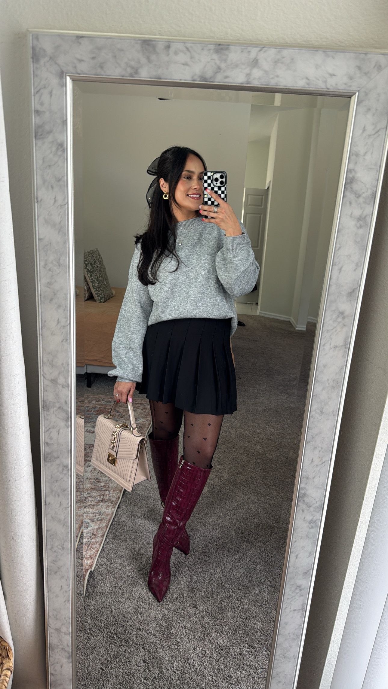 4 days of Valentines day looks. Outfit 2/4  I love a good versatile outfit—these pieces work for V-Day but can totally be worn year-round! 🙌🏼

Outfit Details:
Pleated skirt (Size Small) – stretchy & flattering
Classic grey sweater (Size Medium) – already oversized, should’ve gone with a Small!
Heart stockings – subtle but cute touch (these run very small - size 0-2)
Red heeled boots – the real statement piece!

For reference, I’m 5’2” & 130 lbs—love how comfy & effortless this look is! 💕

#ValentinesDayStyle #OOTD #VersatileFashion #AmazonFinds #VDayLooks

#LTKFindsUnder50 #LTKStyleTip #LTKSeasonal