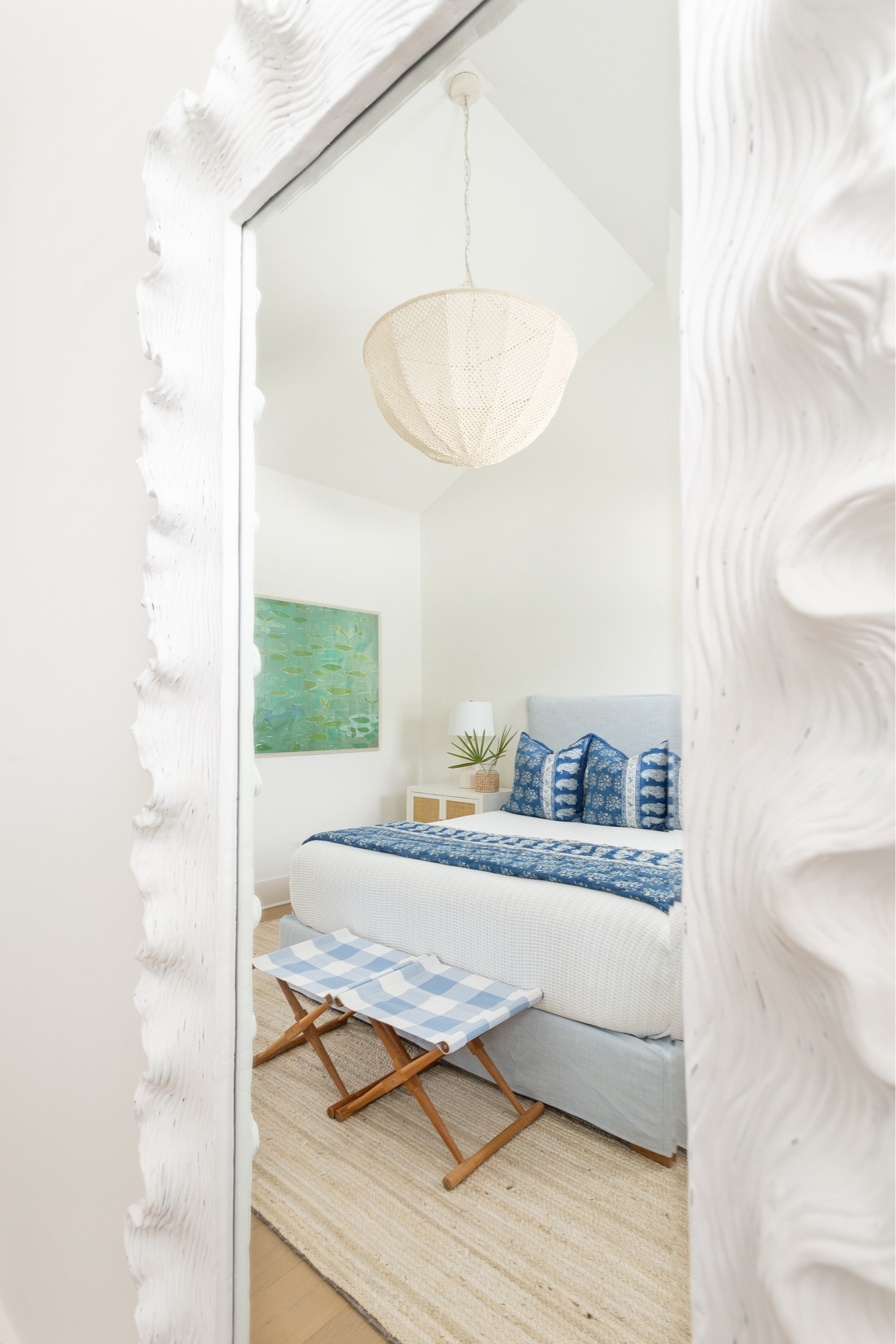 A look at our blue summer bedding! I love that the quilt and euro shams are reversible with two gorgeous flower prints! It looks so pretty with our striped blue sheets, white beaded chandelier, rattan nightstands, coral style mirror, and light blue upholstered bed! Get more details and see all the images here: https://lifeonvirginiastreet.com/blue-summer-bedroom-decor/.
.
#ltkhome #ltkseasonal #ltksalealert #ltkstyletip #ltkfindsunder100 #ltkfindsunder50

#LTKSaleAlert #LTKHome #LTKSeasonal