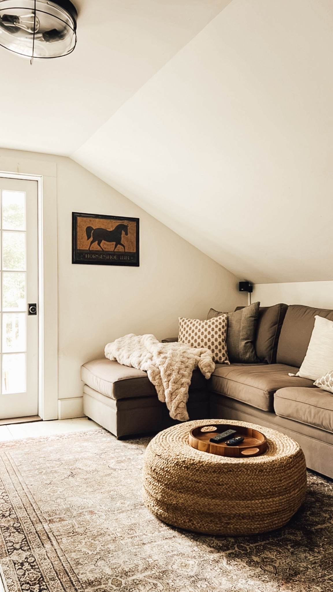 One of the best design decisions we made was to turn this corner of our upstairs into a family room. A cozy spot to watch movies, and relax! Just add pillows, throws and popcorn. What are you binge watching right now? 

#LTKHome