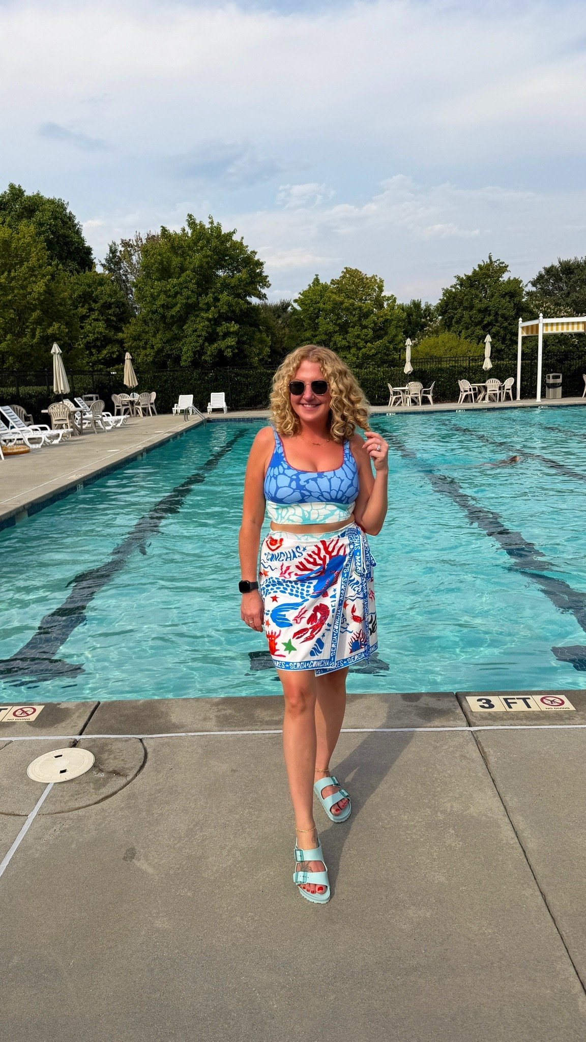If summer had a dress code, this would be it. 💙🦞

This blue swimsuit and lobster-print sarong have been such a fun combination for pool days, beach trips, and everything in between. I love pieces that feel a little playful while still being easy to throw on and wear all day.

Linked the swimsuit, cover-up, sandals, and sunglasses in my LTK. ☀️

#LTKSwim #LTKStyle #CoastalStyle #ResortWear #SummerFashion

blue swimsuit, lobster print cover up, coastal style, resort wear, vacation outfit, beach cover up, sarong outfit, pool day outfit, nautical style, summer fashion, beach vacation outfit, poolside style, vacation wardrobe, swimwear fashion, coastal grandmother style, summer outfit inspiration, women over 40 style, resort outfit ideas

#LTKootd #LTKSwim #LTKTravel