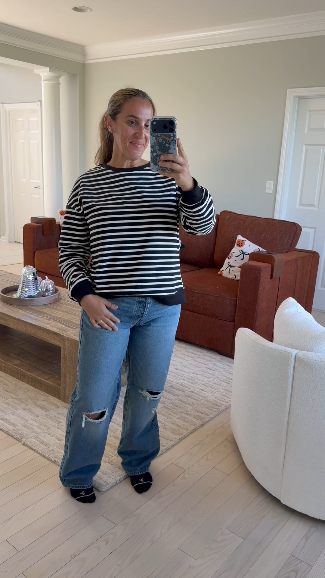 Obsessed with these jeans! I have 3 washes in them! I wear an 8 in them, I’m in between 8/10. Top is a medium! 

#LTKOver40 #LTKFindsUnder50 #LTKSaleAlert