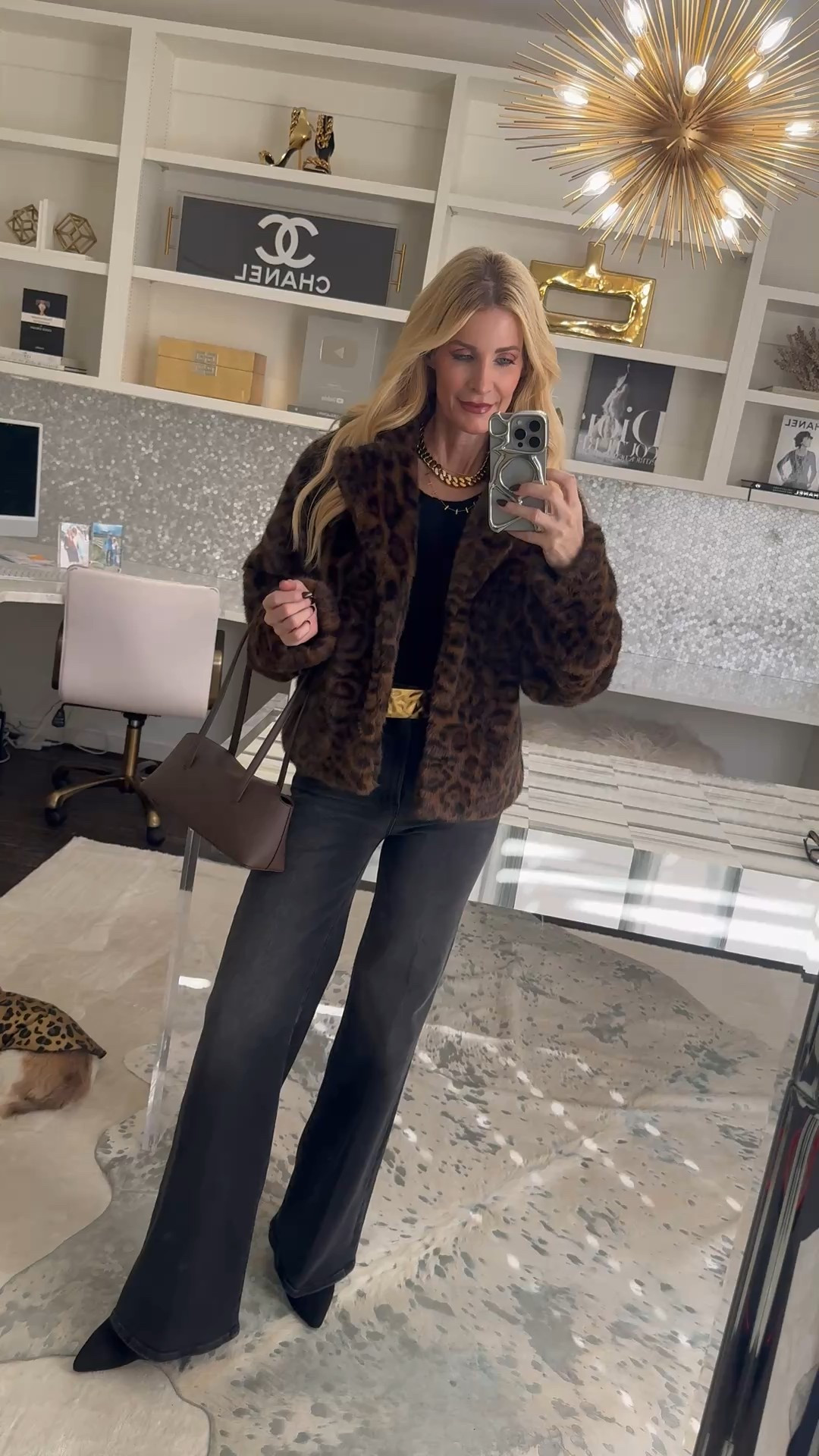 SALE ALERT ✨ This faux fur leopard jacket is on sale right now and it is so good — incredibly soft, cozy, and such a statement piece for winter. I styled it with a lightweight cashmere sweater that’s perfect for layering, my favorite black suede belt with a chic hammered buckle, and ultra-flattering Mother jeans that are both slimming and comfortable. This is one of those outfits that feels luxe but still easy to wear.

I’m wearing an XS in the leopard jacket and it fits true to size. 

 #LTKSeasonal #LTKSaleAlert #LTKFindsUnder100