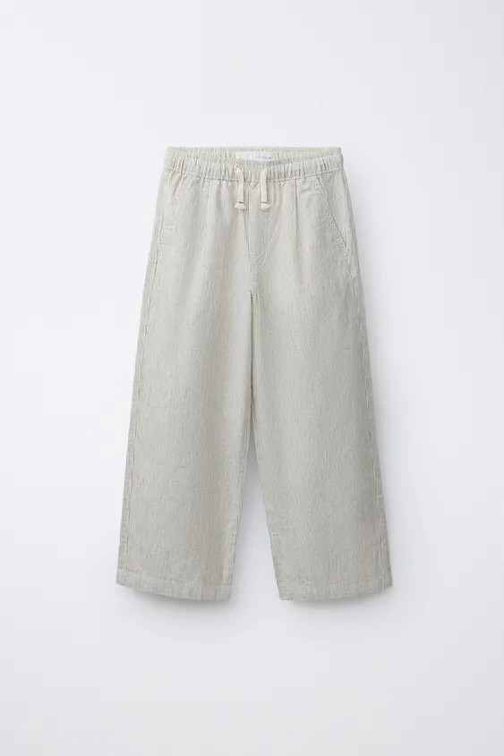 Pyjama-style trousers with an elastic waistband and adjustable front drawstrings. Featuring front... | Zara UK
