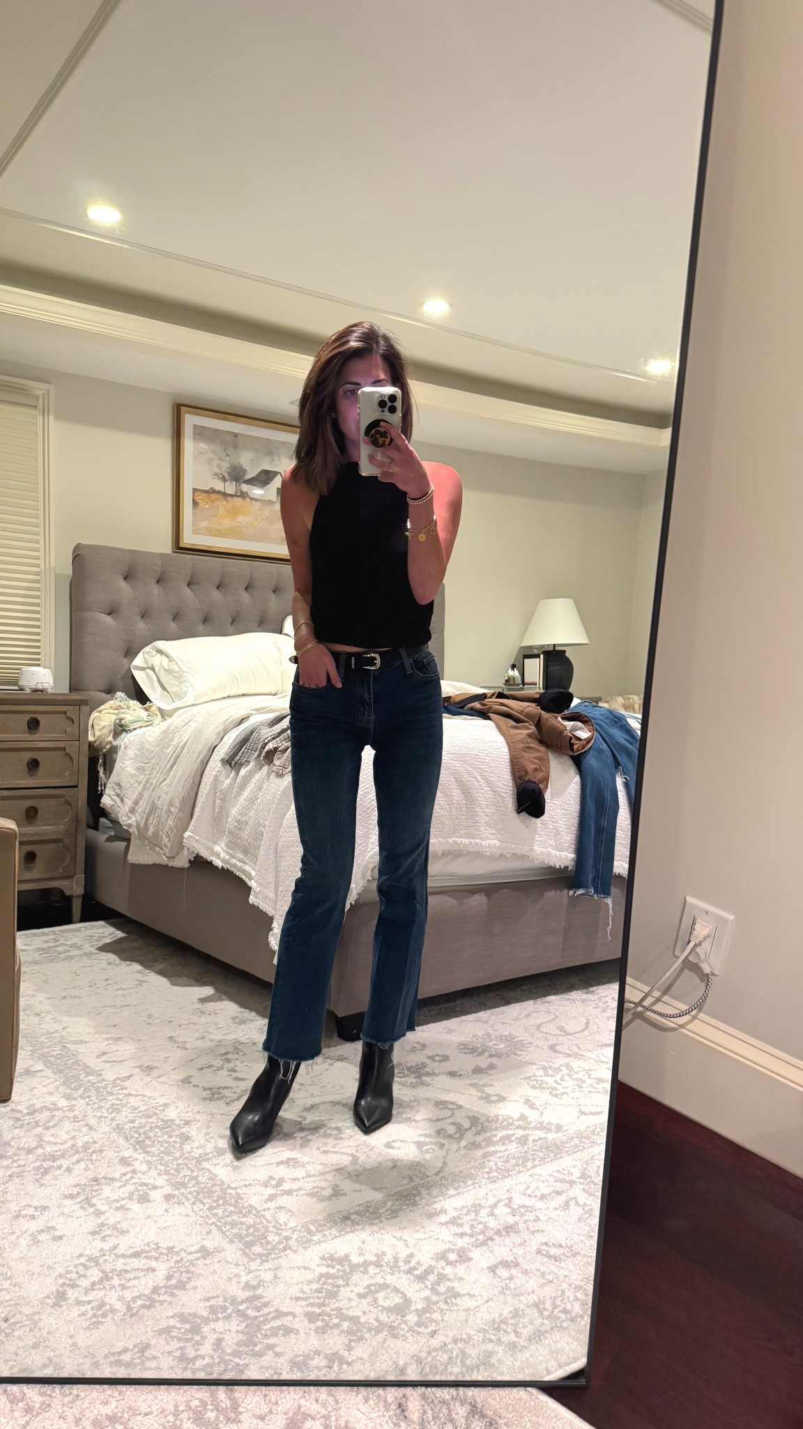 Fall date night outfit black tank cropped denim raw hem low black pointy toed boot 

#LTKFallSale #LTKSeasonal #LTKPetite