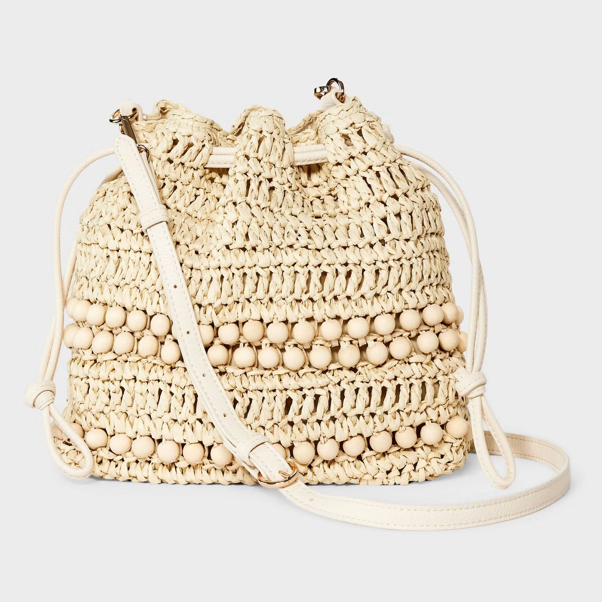 Straw Beaded Drawstring Crossbody Bag - Universal Thread™ Light Beige | Target