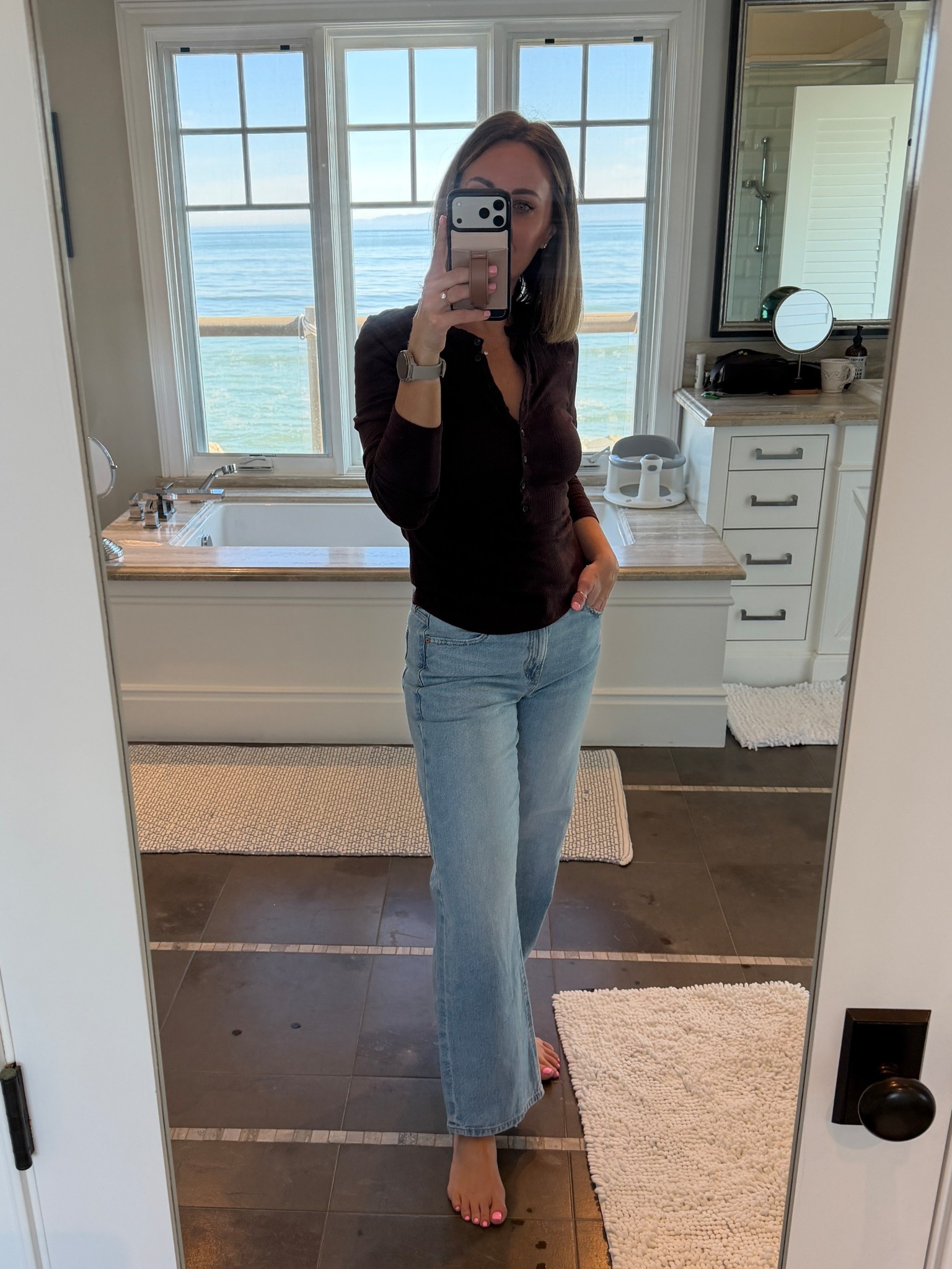 Large in top, 4 regular in jeans  