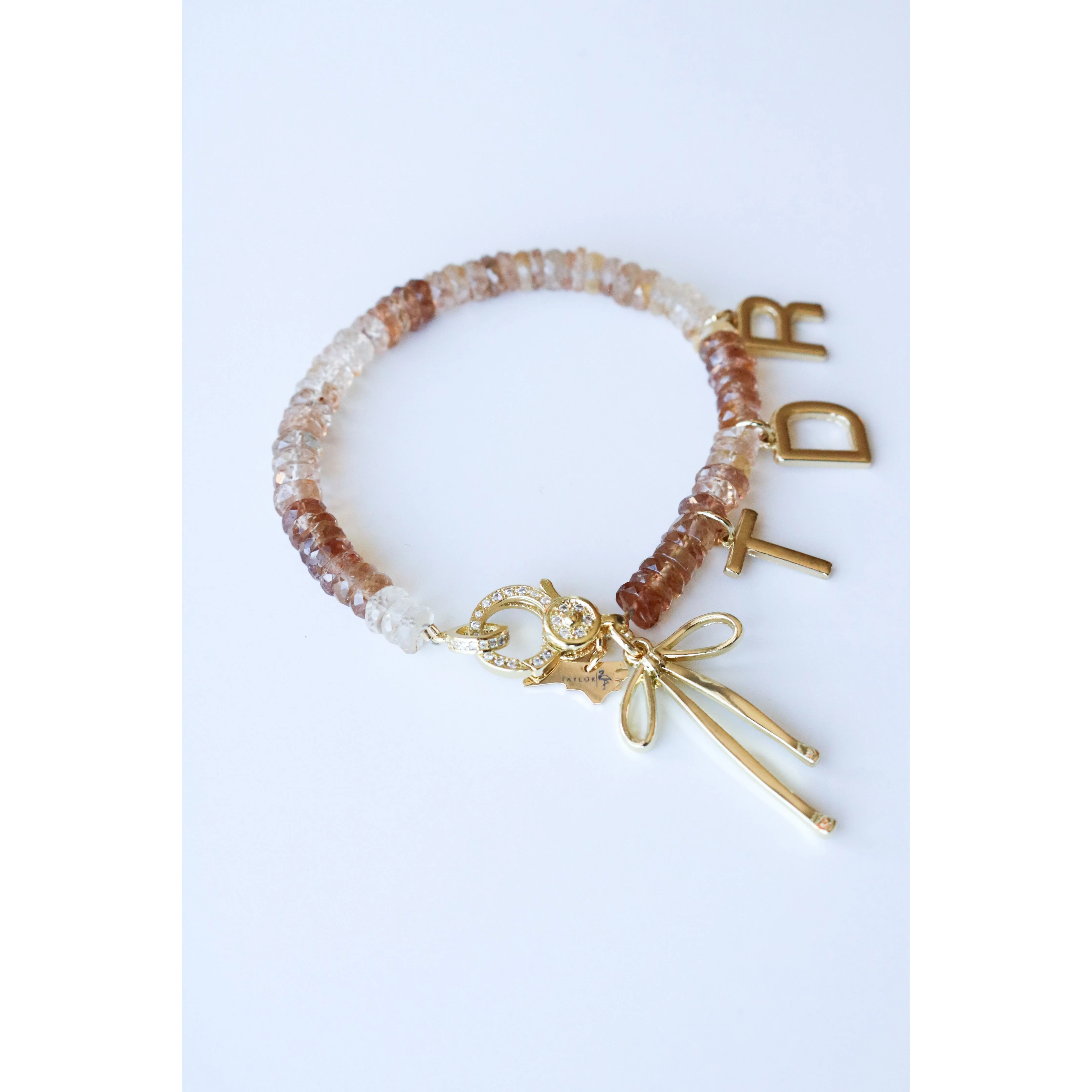 Imperial Topaz Beaded Bow Charm Bracelet | Taylor Reese