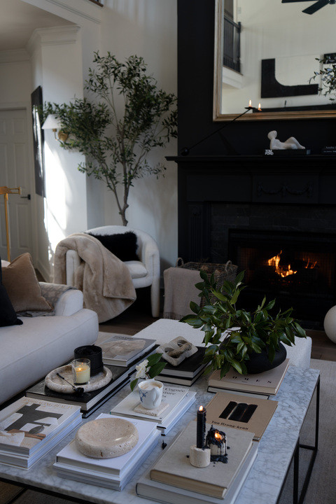 OMG YOU GUYS!!! My coffee table just became the focal point of the living room. Marble layered with neutral accessories, stacked books, and sculptural decor brings that calm luxury home aesthetic. The whole space feels curated, peaceful, and magazine worthy!!!! I hope you love it as much as I do! XxV  

 #LTKSeasonal #LTKOver40 #LTKHome