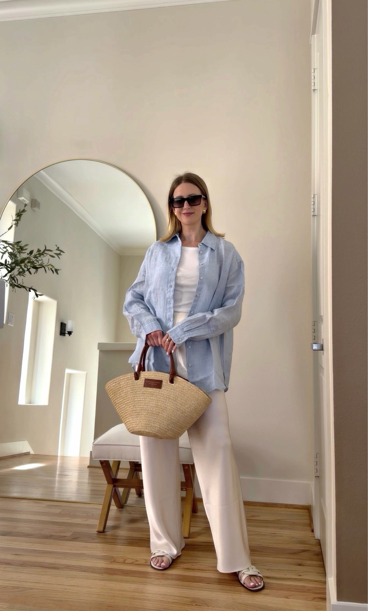 With this hot weather in Texas, I’m loving this light blue linen top from Holland and Cooper. It’s the perfect weight linen! Styling it with my Sezane bag I’ve had for a while and my pants are from April Seven Studio which I can’t link, but I linked several similar styles. ￼

#LTKgrwm #LTKdayinmylife #LTKootd