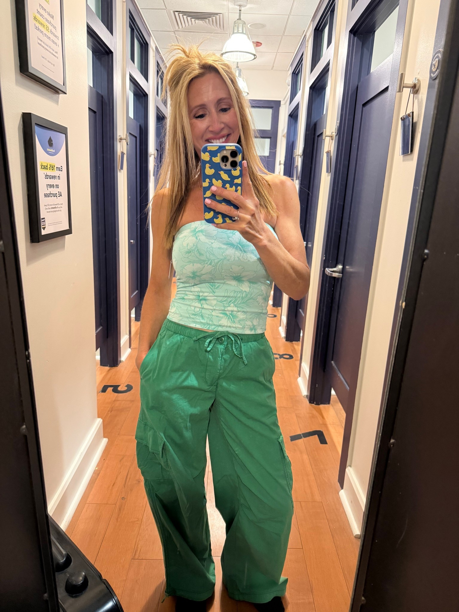 This!! Vibrant green adjustable waist cargo pants, paired with a reversible flower print tube top from American Eagle. True to size for American Eagle. Small in the top and xxsmall in the bottoms 

#LTKOver40 #LTKxAerie #LTKgrwm
