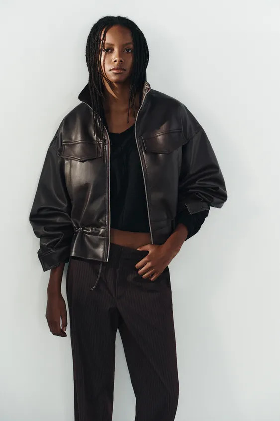 Jacket with a high collar and long, drop-shoulder sleeves. Adjustable drawstring waist. Featuring... | Zara IT