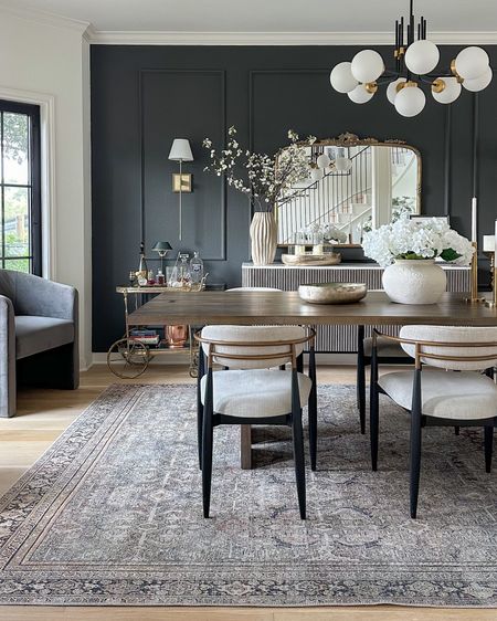 Moody dining room views 🖤

Rug is in the Olive/Charcoal! Dining chairs are Cary Linen. Linked a couple designer inspired look for less versions of these! 

#LTKHome #LTKSaleAlert #LTKStyleTip
