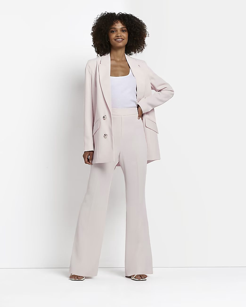 Pink flared trousers | River Island (UK & IE)