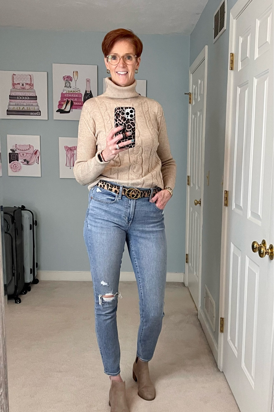 An effortless chic classic look with this super comfortable cable knit sweater, distressed jeans, booties, and a little leopard.

Cable knit sweater, distressed jeans, classic outfit, fall outfit, leopard, booties

#LTKstyletip
