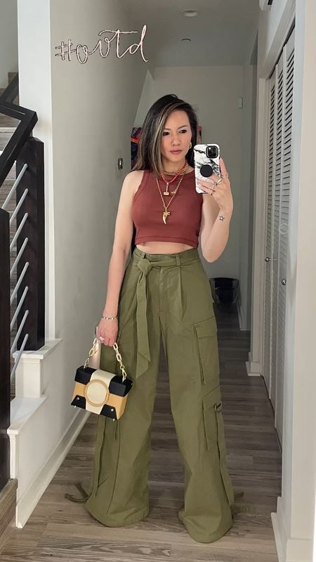 Date night outfit 🧡 Ready to go see a comedy show tonight. Loving this rust color tank top that is under $40! Plus baggy cargo pants forever! 

Date night outfit, date night, spring outfit, summer outfit, crop top, tank top, cargo pants, cargos, The Stylizt 

#LTKStyleTip #LTKFindsUnder50 #LTKFindsUnder100