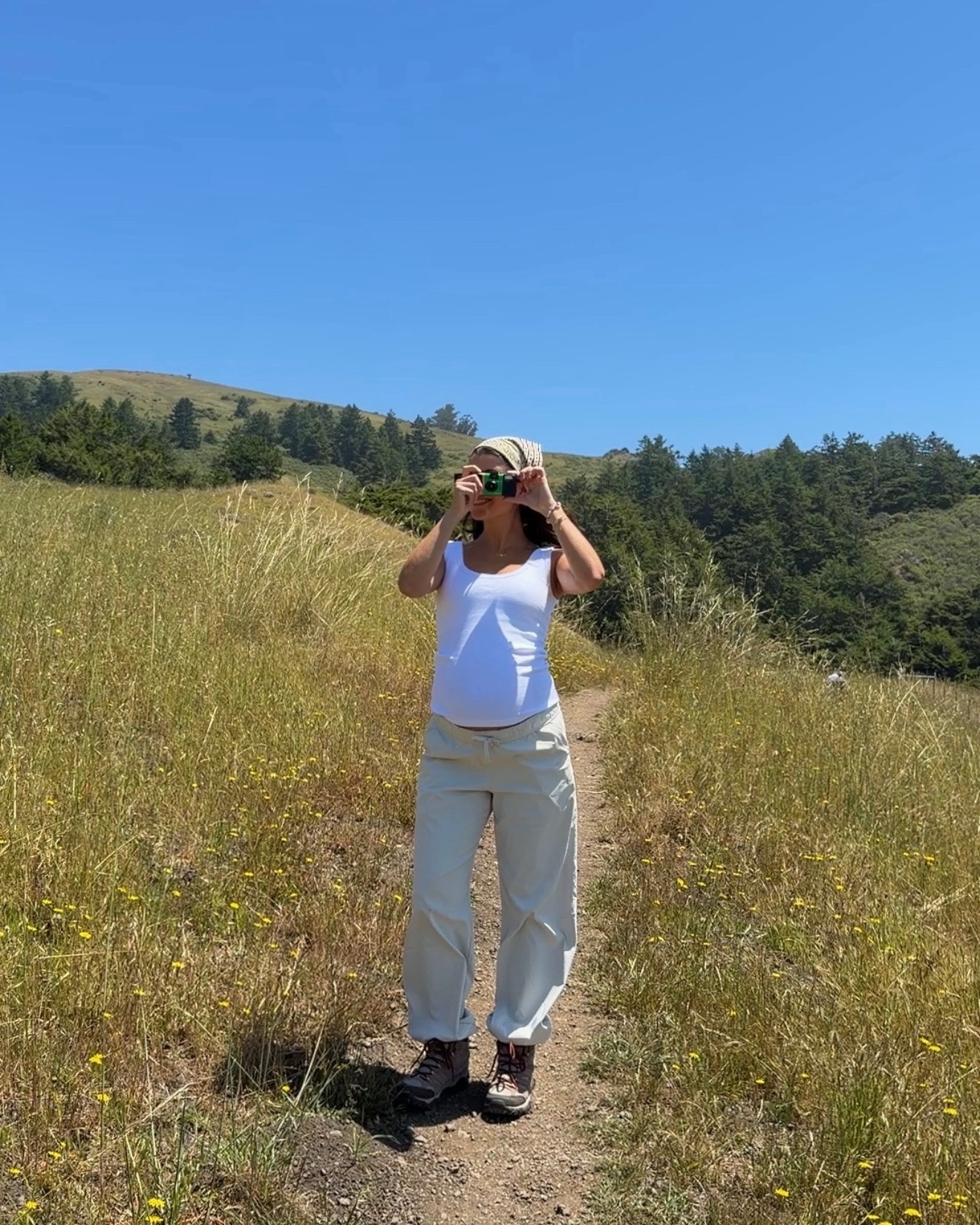[6/3/26] hiking ootd 🥾pants are @underarmour unstoppable woven joggers, wearing size small in regular length and works so well with the bump at 24 weeks! hiking boots are a few years old but such great quality, I’m wearing the Women’s Moab 3 Mid Gore Tex, currently on sale!