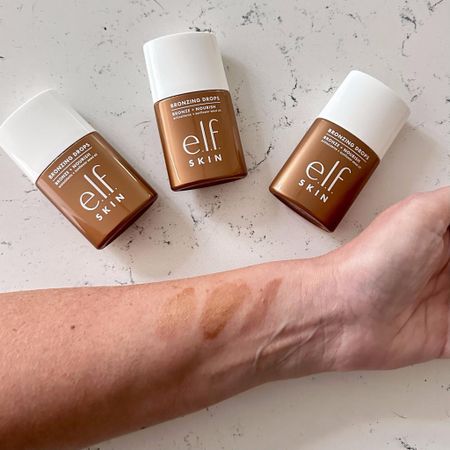 🔥 The viral e.l.f Bronzing Drops are here!!! Here's my quick pathetic swatching attempt and my thoughts on color! I have a medium, neutral skin tone. The Rose Gold is on the left, it's the most subtle and probably works for fair to medium skin tones to give a bronzy glow when mixed with moisturizer (similar to Drunk Elephant). The middle is Pure Gold and IRL it pulls very yellowish on my skin - would probably work for medium to darker skin tones for some glow. The right is Copper Gold which is the deepest - will be great for contour for me or even on my cheekbones for some definition... It's actually my fave color of the 3 - but likely too dark to use all over my face. Three colors available ⬇️! (#ad)

#LTKBeauty #LTKxelfCosmetics #LTKFindsUnder50