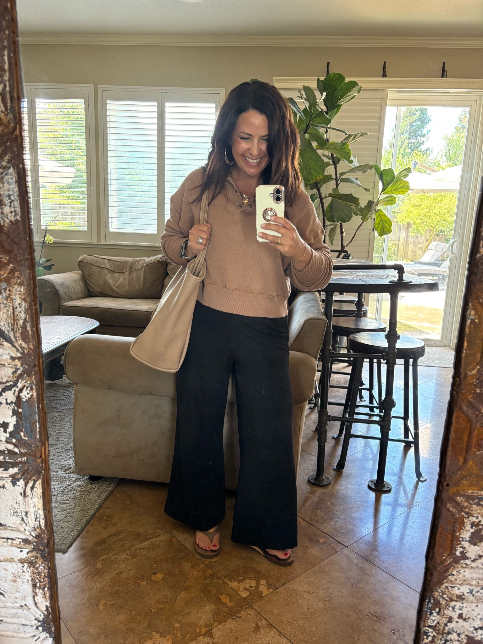 Tournament mornings = coffee, comfy clothes, and a tote full of snacks. 🏀🤎

This oversized sweatshirt, wide-leg pants, flip flops, and roomy tote are my go-to for long days in the gym. Comfortable, easy, and perfect for carrying all the snacks, water bottles, and everything else that somehow comes along for a basketball tournament.

#LTKmomlife #LTKOver40 #LTKPetite