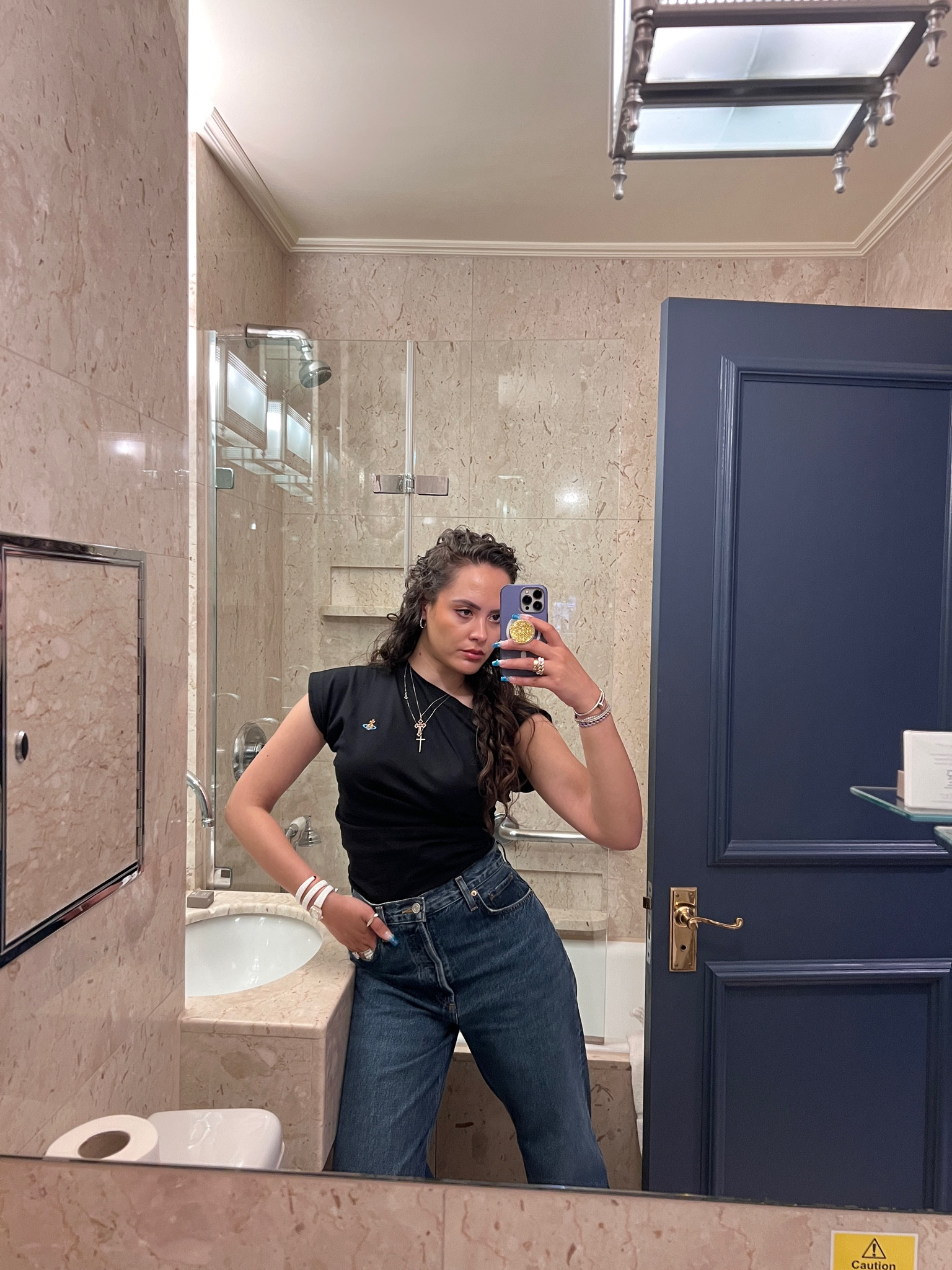 Black t-shirt, blue jeans 

#LTKstyletip #LTKSeasonal #LTKeurope