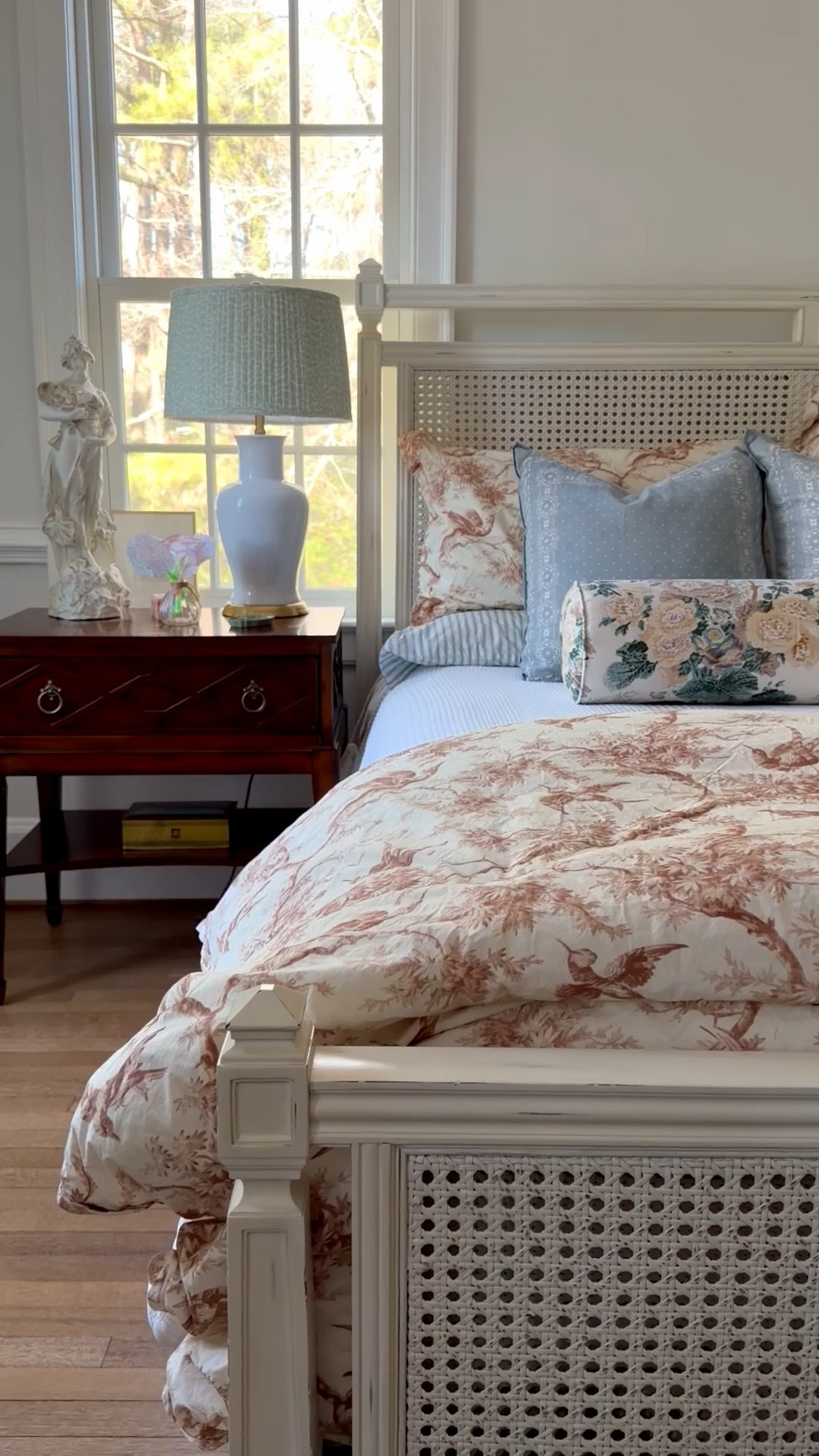 Bedroom cane bed Althea bolster white bedding tea tobacco colored duvet pleated shade white bedside lamp 

#LTKHome #LTKmomlife #LTKmorningroutine