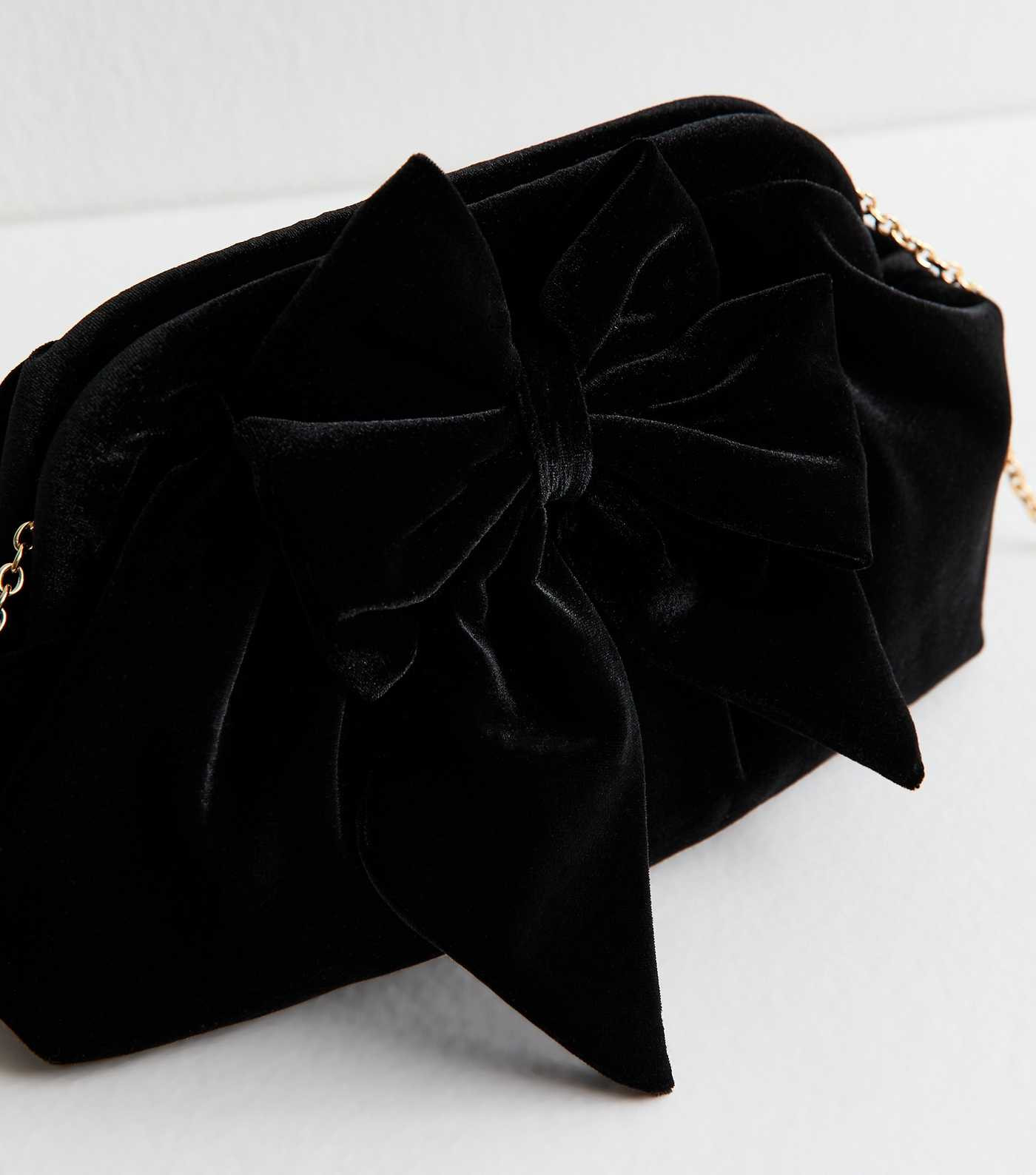 Black Bow Applique Velvet Slouch Clutch Bag | New Look | New Look (UK)
