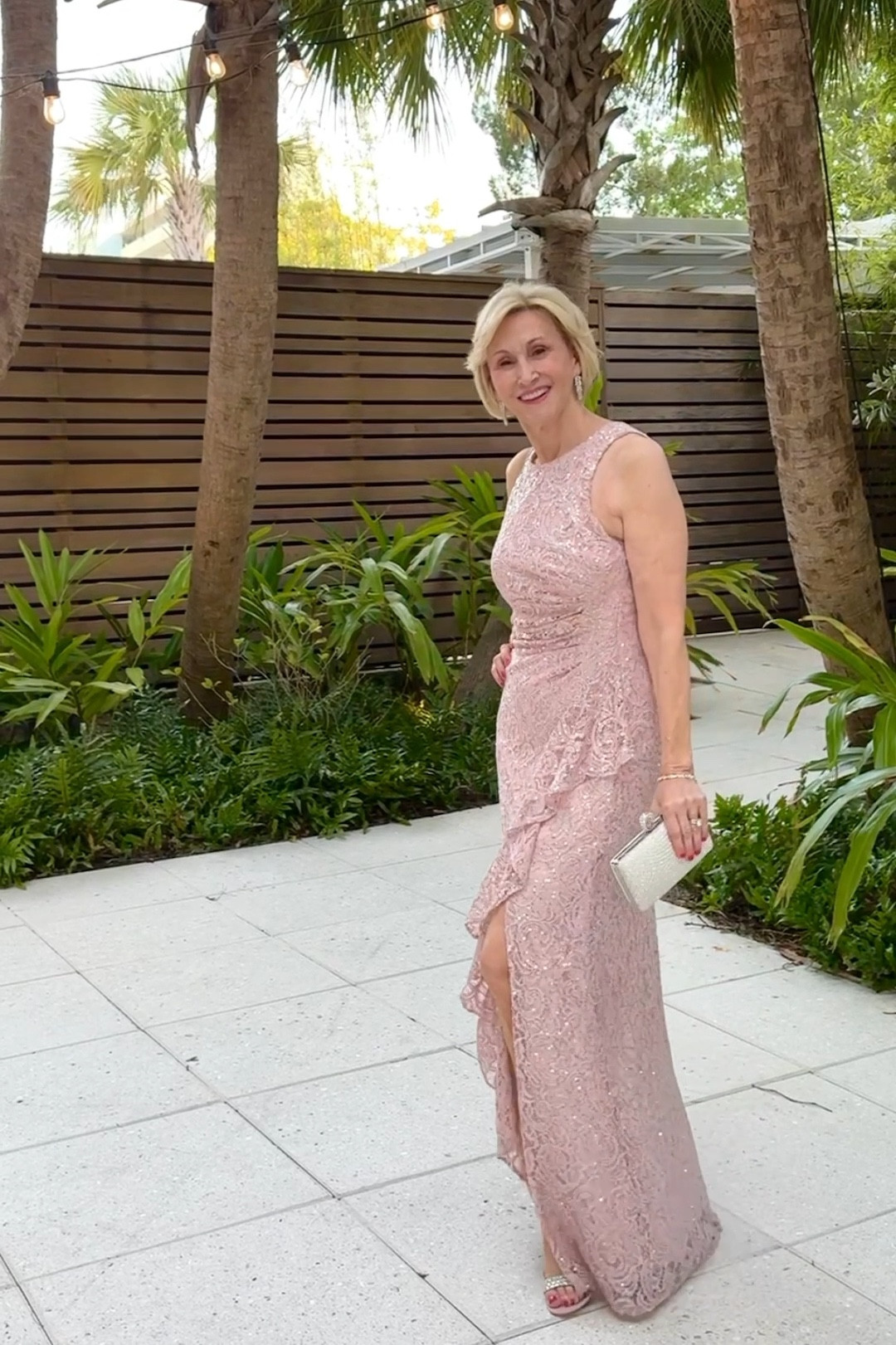 Are you a Mother of the Bride or Groom who is stressed out about what to wear? This elegant lace gown from @alexevenings will make you look like the Queen Mama you are! I love the romantic ruffle and sophisticated side slit. Plus, this gorgeous shade of blush pink complements nearly any bridal party color palette!


#LTKVideo #LTKOver40 #LTKWedding