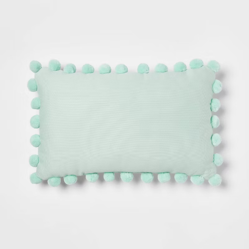 Oblong Pom-Pom Throw Pillow - Pillowfort™ | Target