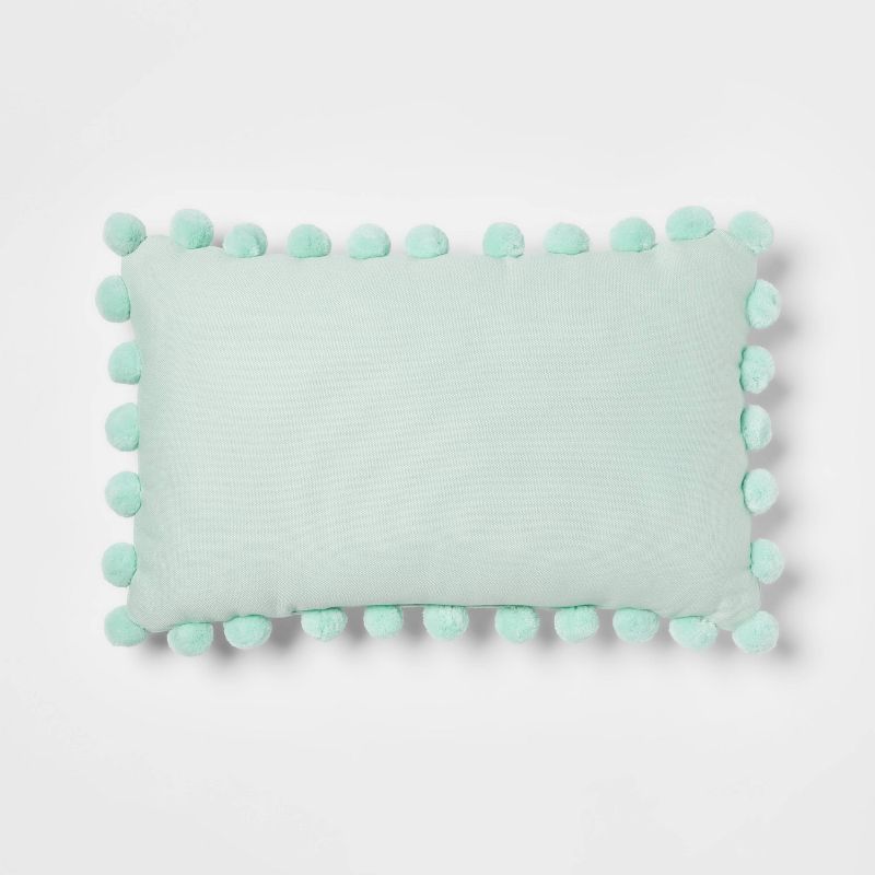 Oblong Pom-Pom Throw Pillow - Pillowfort™ | Target